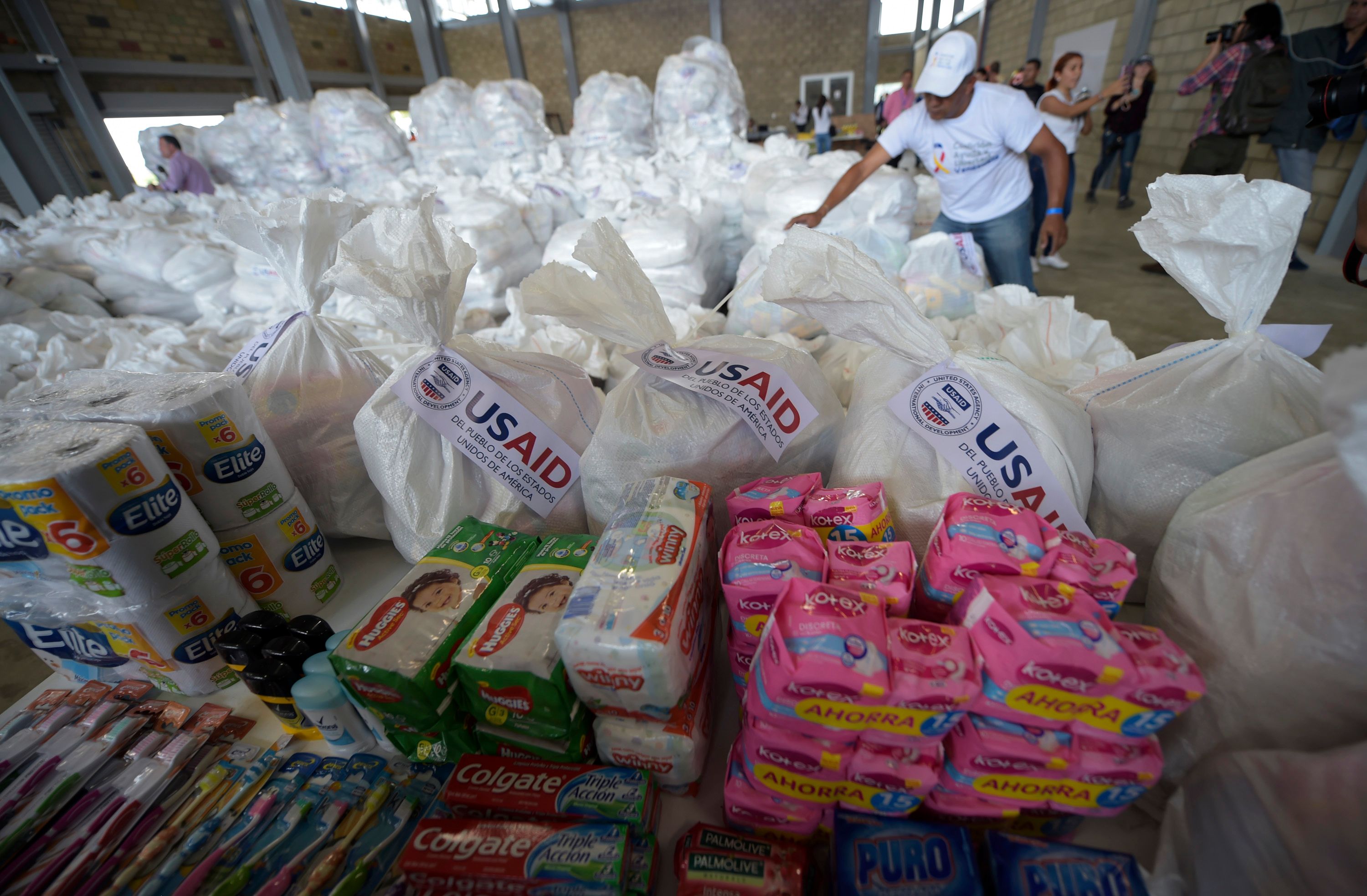 View of US humanitarian aid goods in Cucuta, Colombia, on the border with Tachira, Venezuela, on February 9, 2019. - Venezuelan military officers blocked a bridge on the border with Colombia ahead of an anticipated humanitarian aid shipment, as opposition leader Juan Guaido stepped up his challenge to President Nicolas Maduro's authority. (Photo by Raul Arboleda / AFP)