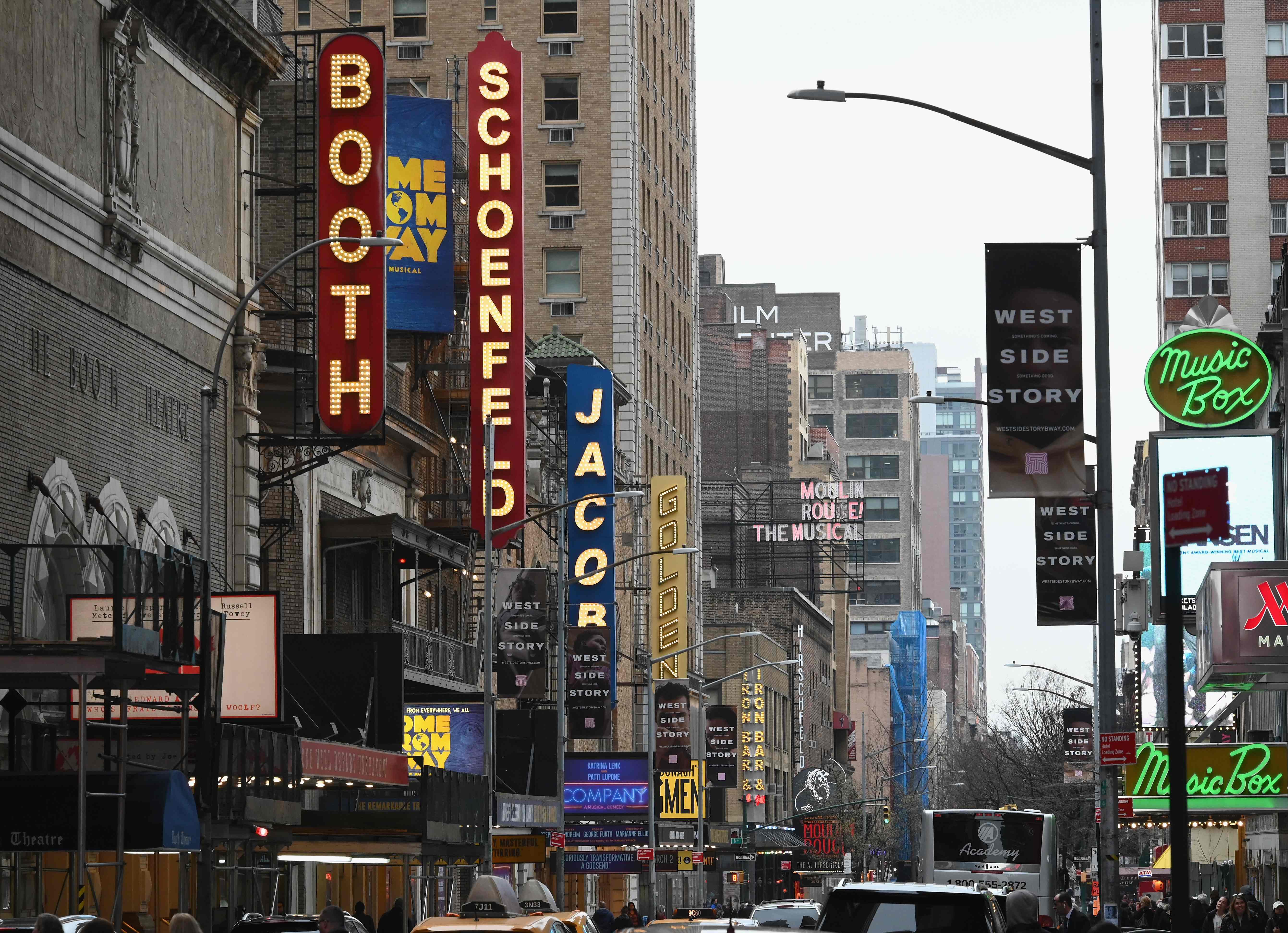 A view of signage of Broadway plays is seen on March 12, 2020 in New York City. - New York Governor Andrew Cuomo on March 12, 2020 banned public gatherings of more than 500 people, including shows in Manhattan's iconic Broadway theater district. Only schools, hospitals, nursing homes and mass transit facitilities are excepted from the rule -- which goes into effect for Broadway at 5:00 pm March 12, 2020, and 24 hours later everywhere else, Cuomo told journalists. (Photo by Angela Weiss / AFP)