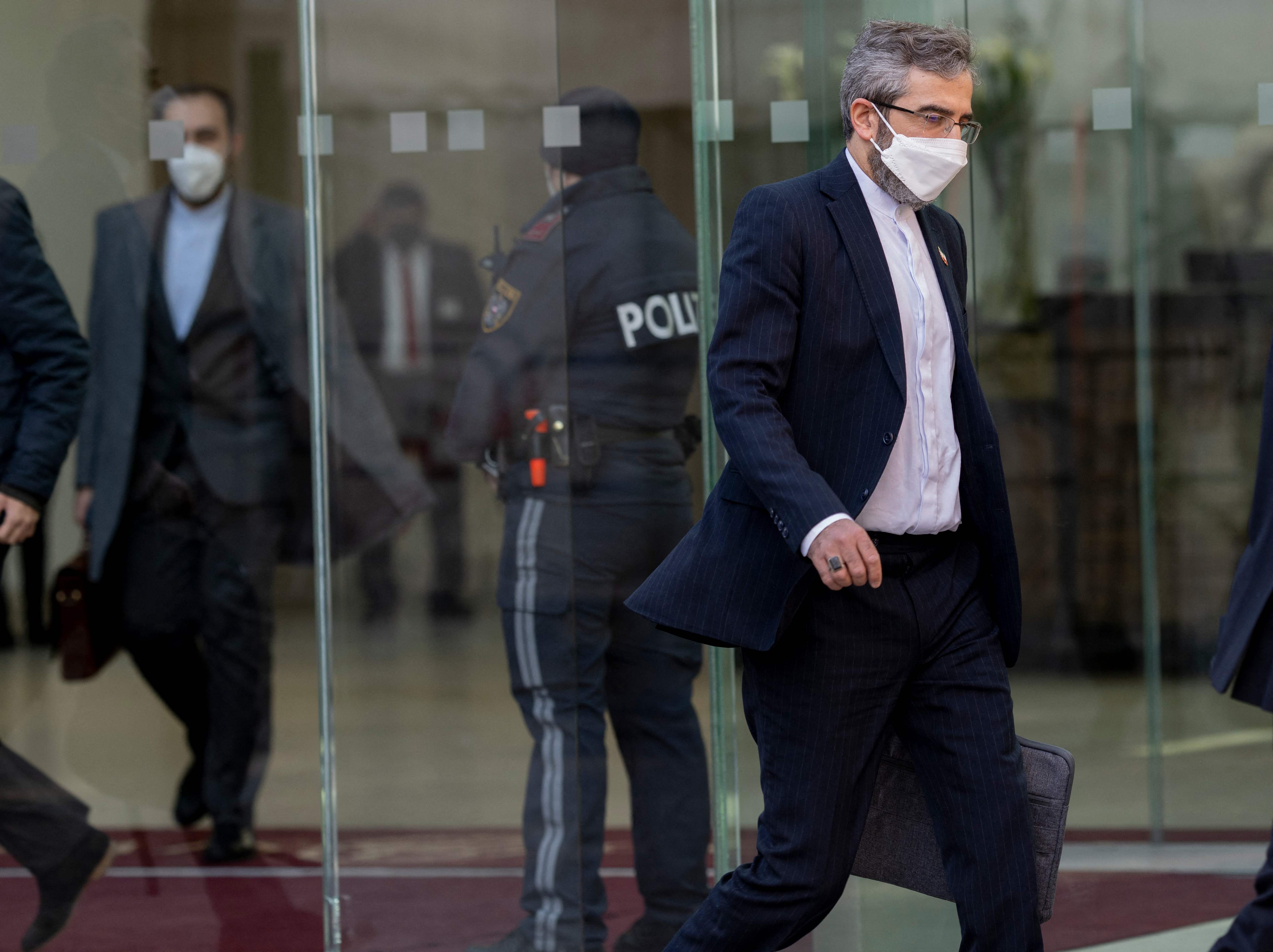Iran's chief nuclear negotiator Ali Bagheri Kani is leaving the Coburg Palais, the venue of the Joint Comprehensive Plan of Action (JCPOA), after his meeting with Deputy Secretary General of the European External Action Service (EEAS) Enrique Mora (not pictured), in Vienna on March 11, 2022. - The EU said on March 11, 2022 that the talks it is chairing on the revival of the 2015 Iran nuclear accord must be paused, days after fresh demands from Russia complicated negotiations. (Photo by JOE KLAMAR / AFP)