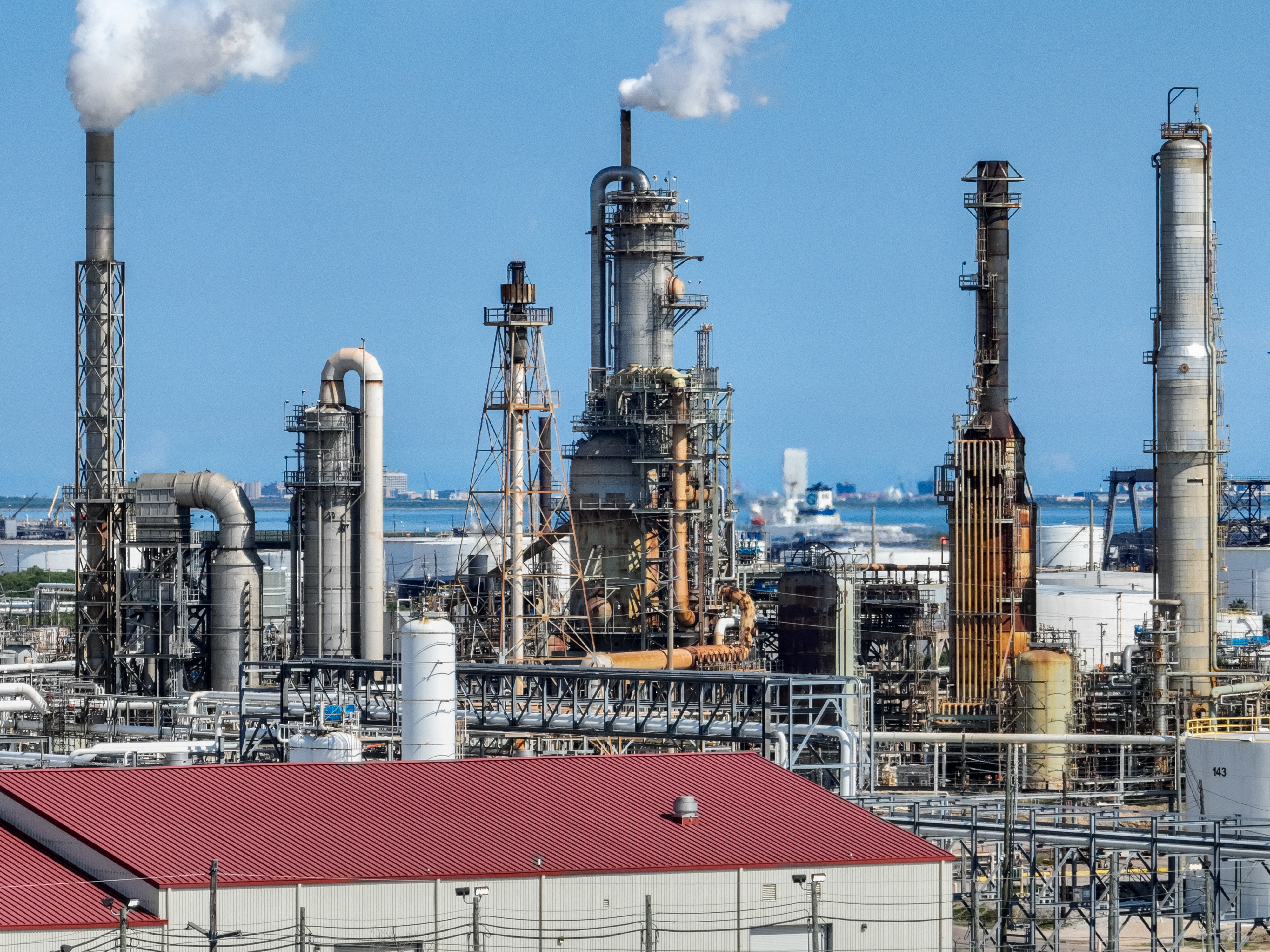 TEXAS CITY, TEXAS - SEPTEMBER 07: In an aerial view, an oil refinery is seen on September 07, 2022 in Texas City, Texas. Oil and gas companies in Texas have sent more than $10 billion in oil and natural gas production taxes to the state this year according to the state comptroller. Brandon Bell/Getty Images/AFP (Photo by Brandon Bell / GETTY IMAGES NORTH AMERICA / Getty Images via AFP)