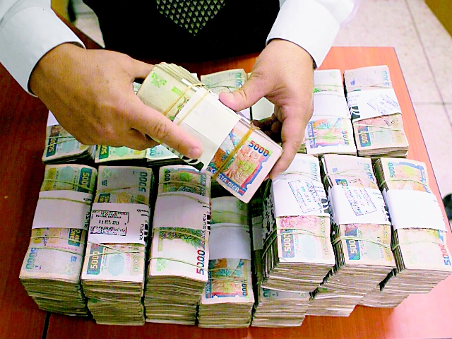 Banca ahorraría millones con menos efectivo | La Nación