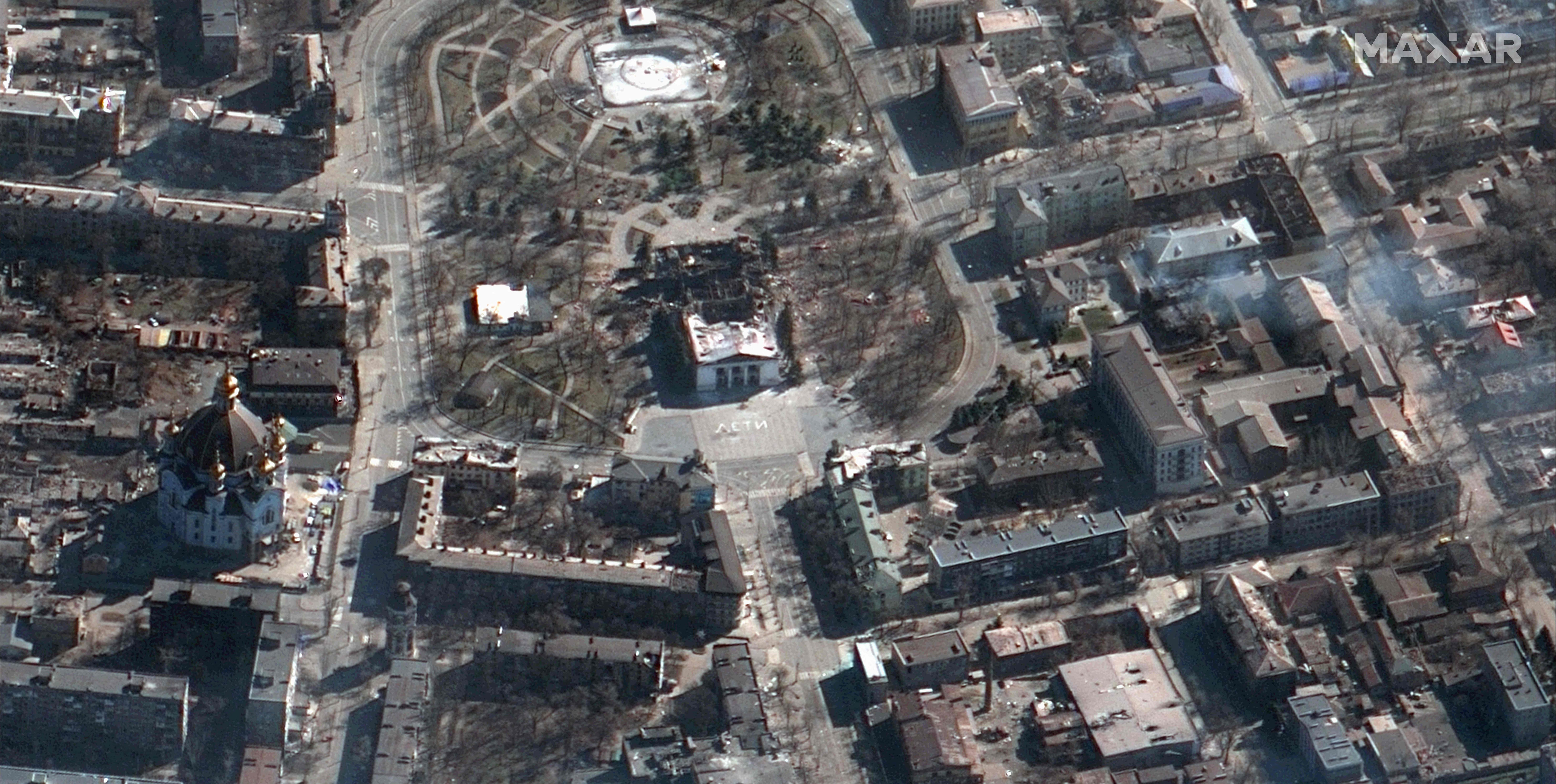 This handout picture taken and released on March 19, 2022 by Maxar satelitte image shows the aftermath of the airstrike on the Mariupol Drama Theater, in Mariupol southern Ukraine. - Rescuers in Ukraine searched on March 19, 2022 for hundreds of civilians feared trapped under the wreckage of a bombed theatre, as local forces battled against Russian troops across the country. (Photo by AFP) / XGTY / RESTRICTED TO EDITORIAL USE - MANDATORY CREDIT "AFP PHOTO / Satellite image �2022 Maxar Technologies " - NO MARKETING - NO ADVERTISING CAMPAIGNS - DISTRIBUTED AS A SERVICE TO CLIENTS - THE WATERMARK MAY NOT BE REMOVED/CROPPED / THE WATERMARK MAY NOT BE REMOVED/CROPPED