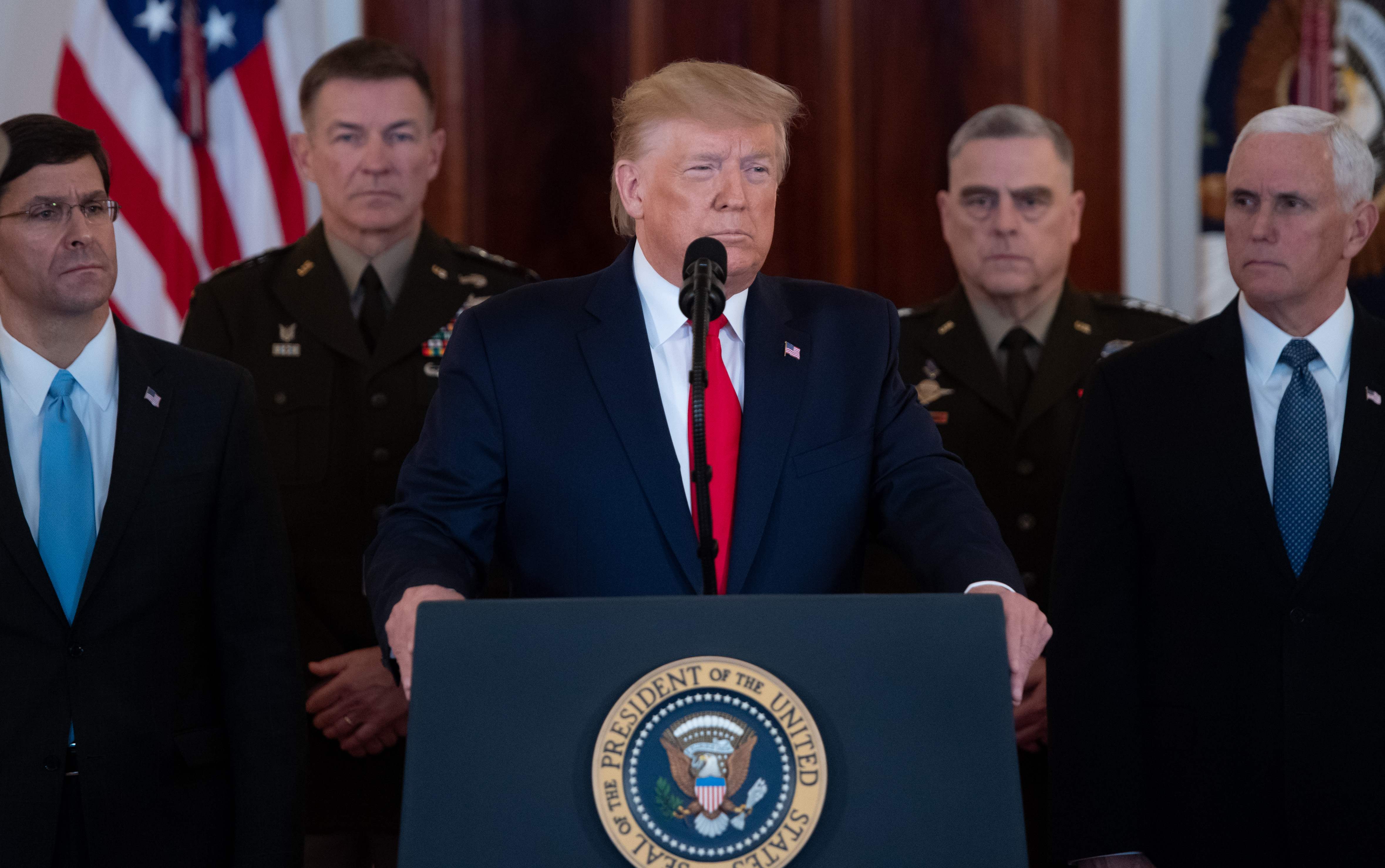 US President Donald Trump speaks about the situation with Iran in the Grand Foyer of the White House in Washington, DC, January 8, 2020. - US President Donald Trump said Wednesday Iran appeared to be "standing down" after missile strikes on US troop bases in Iraq that resulted in no American or Iraqi deaths. "All of our soldiers are safe and only minimal damage was sustained at our military bases. Our great American forces are prepared for anything," he said in an address to the nation from the White House. (Photo by SAUL LOEB / AFP)