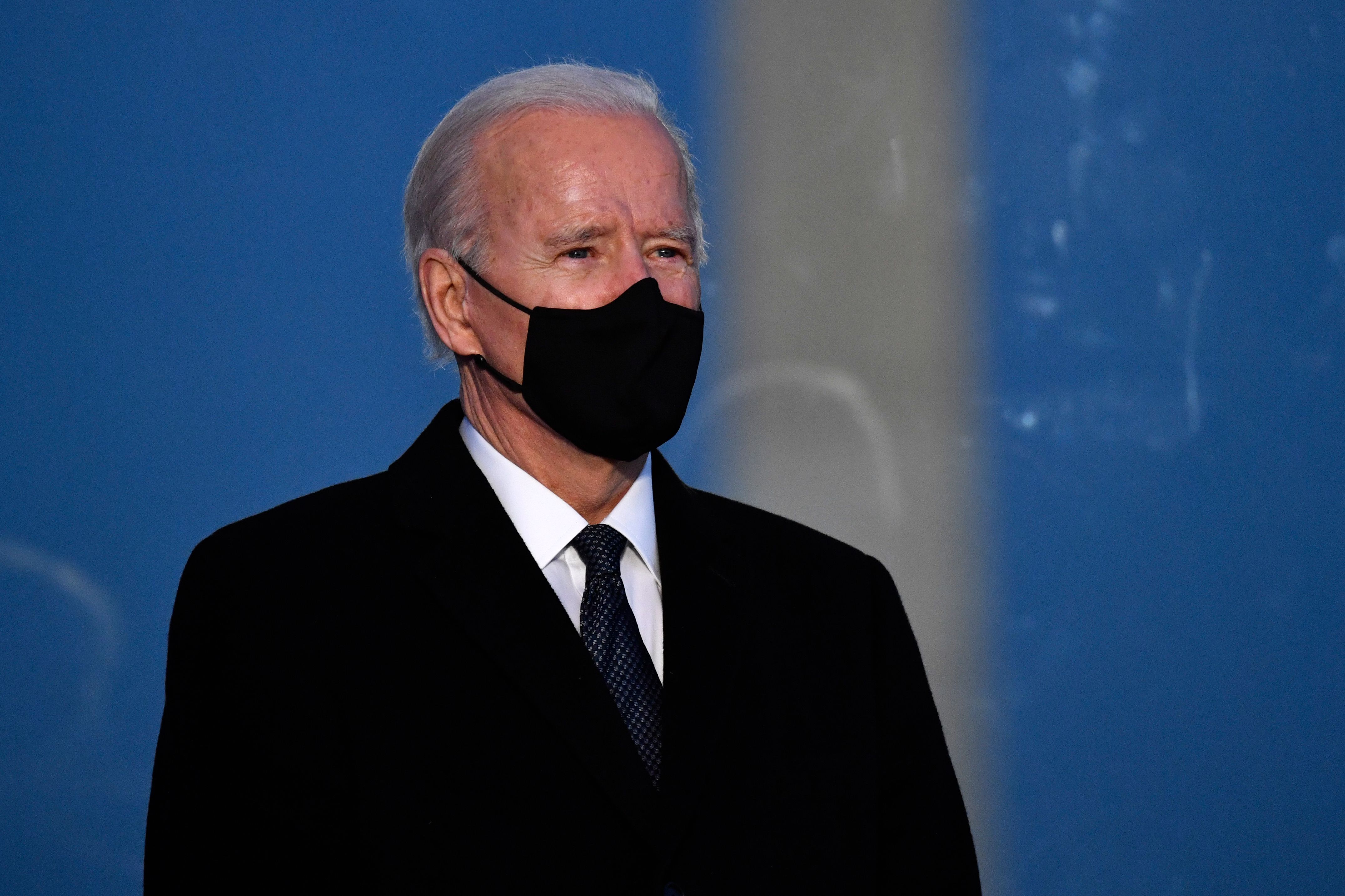 US President-elect Joe Biden attends a Covid-19 Memorial at the Lincoln Memorial in Washington, DC, on January 19, 2021 to honor the lives of those lost to Covid-19. (Photo by Patrick T. FALLON / AFP)