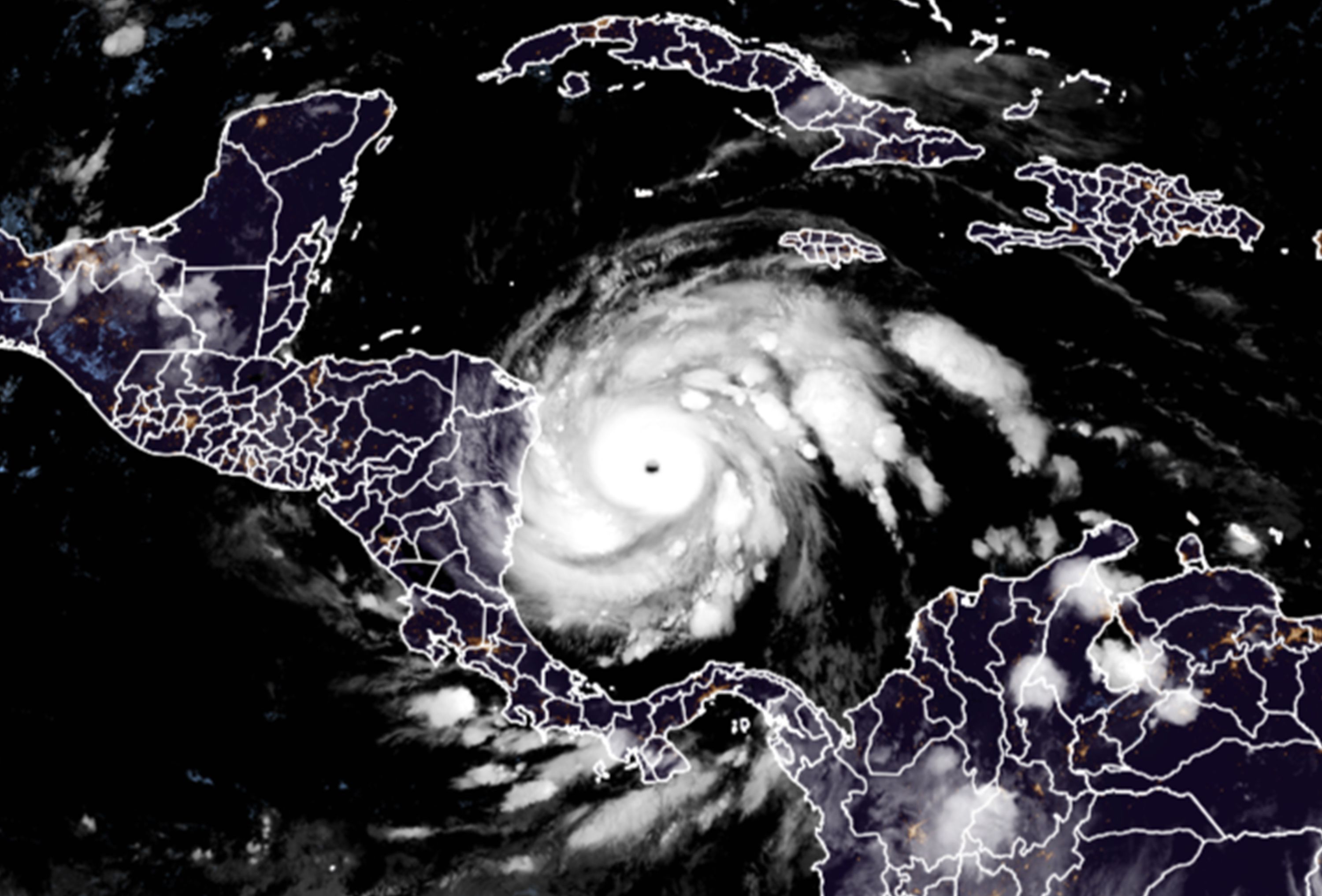 This RAMMB/CIRA satellite image shows Hurricane Iota on November 16, 2020 at 06:50 UTC as it approaches Central America. - Hurricane Iota is forecast to strengthen to an "extremely dangerous" Category Four by the time it makes landfall in Central America on November 16, the US National Hurricane Center warned, two weeks after powerful storm Eta devastated much of the region and left more than 200 people dead or missing. (Photo by - / RAMMB/CIRA / AFP) / RESTRICTED TO EDITORIAL USE - MANDATORY CREDIT "AFP PHOTO / RAMMB/CIRA " - NO MARKETING - NO ADVERTISING CAMPAIGNS - DISTRIBUTED AS A SERVICE TO CLIENTS