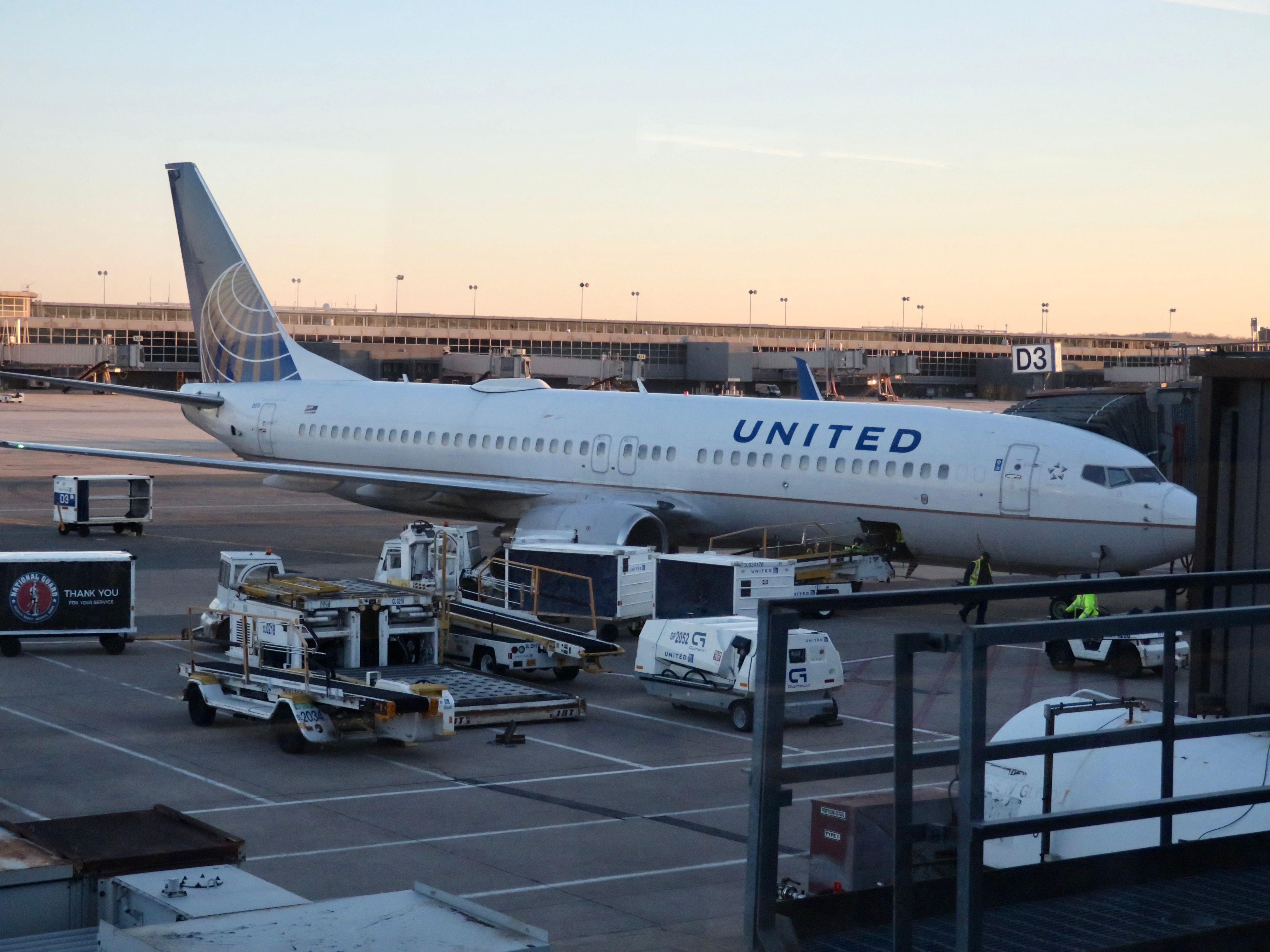 (FILES) In this file photo taken on March 02, 2021 (FILES) In this file photo taken on March 2, 2021 A United Airlines Boeing 737 plane is seen at the gate at Washington's Dulles International Airport in Dulles, Virginia, on March 2, 2021 - The United States on August 22, 2021 enlisted several major airlines in its frantic evacuation of tens of thousands of Afghans, Americans and other foreigners from Kabul following its fall to Taliban extremists. Secretary of Defense Lloyd Austin activated the rarely-used Civil Reserve Air Fleet (CRAF) to aid the onward movement of people arriving at US bases in the Middle East, the Pentagon said. Eighteen civilian craft, from American Airlines, Atlas, Delta, Omni, Hawaiian and United, will aid dozens of military cargo transports involved in the evacuation, the statement said. (Photo by Daniel SLIM / AFP)