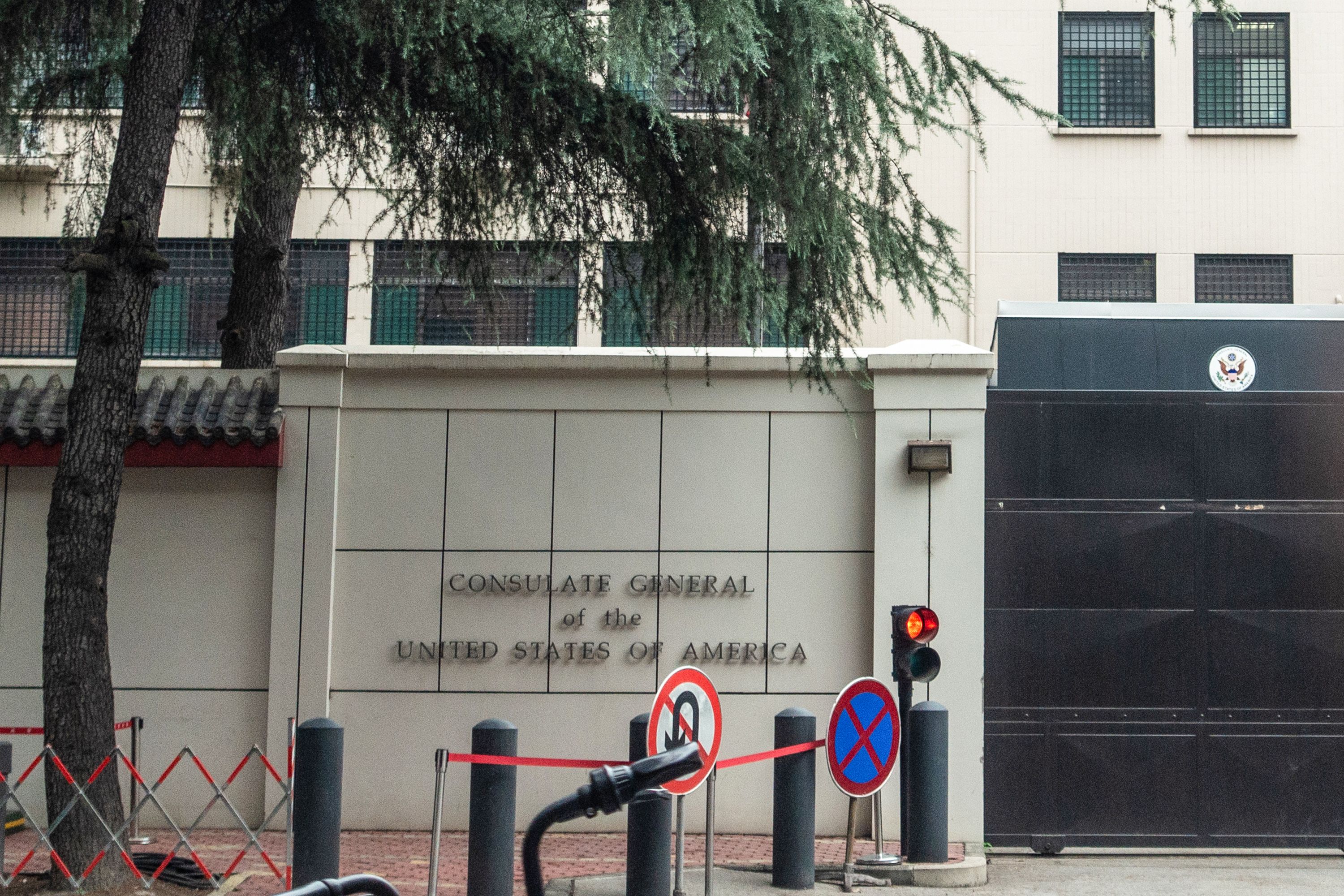 This photo taken on July 23, 2020 shows the entrance of the US consulate in Chengdu, southwest China's Sichuan province. - China on July 24 ordered the closure of the US consulate in the southwestern city of Chengdu, in retaliation for America shuttering Beijing's diplomatic mission in Houston this week. (Photo by STR / AFP) / China OUT