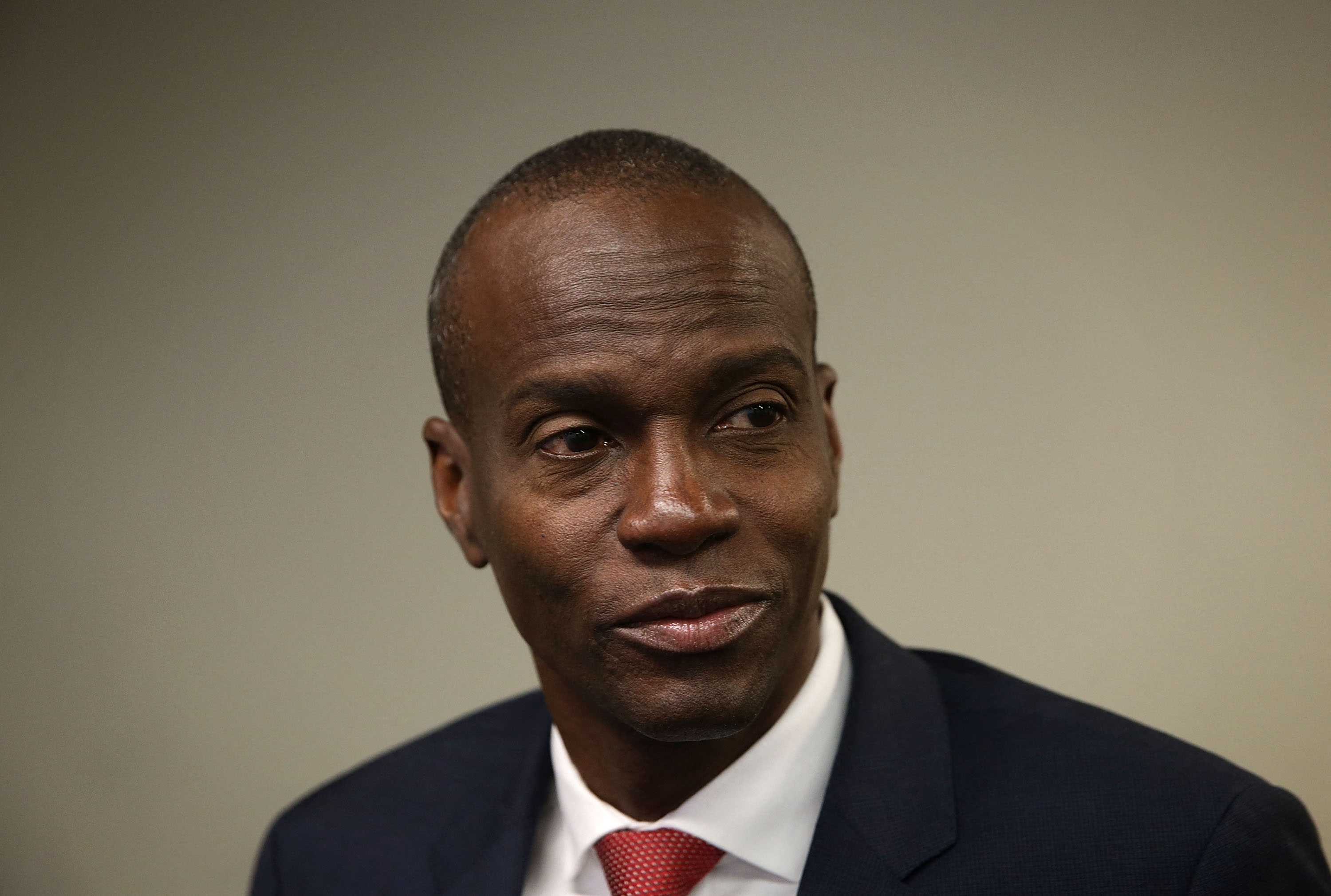 (FILES) In this file photo taken on April 20, 2016 then Haitian presidential candidate Jovenel Moise arrives at the National Press Club in Washington, DC. - Haitian President Jovenel Moise was assassinated on July 7, 2021, at his home by a commando, interim Prime Minister Claude Joseph announced. Joseph said he was now in charge of the country. (Photo by ALEX WONG / GETTY IMAGES NORTH AMERICA / AFP)