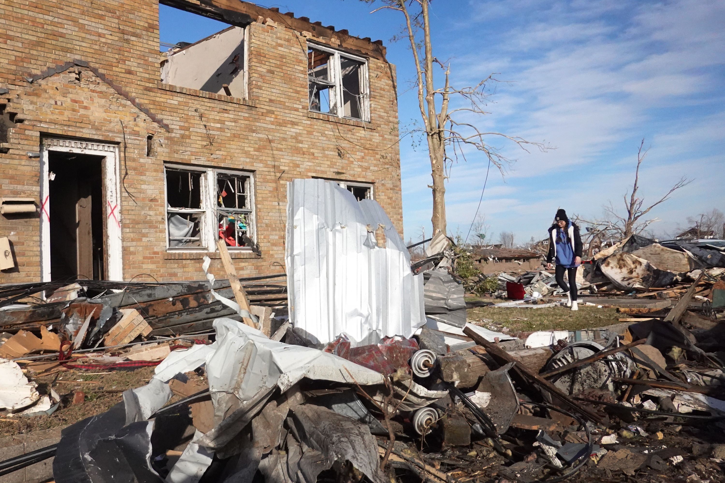 MAYFIELD, KENTUCKY - DECEMBER 11: Residents begin the process of salvaging their belongings after a tornado ripped through the area the previous evening on December 11, 2021 in Mayfield, Kentucky. Multiple tornadoes touched down in several Midwest states late evening December 11 causing widespread destruction and leaving an estimated 70-plus people dead. Scott Olson/Getty Images/AFP
== FOR NEWSPAPERS, INTERNET, TELCOS & TELEVISION USE ONLY ==