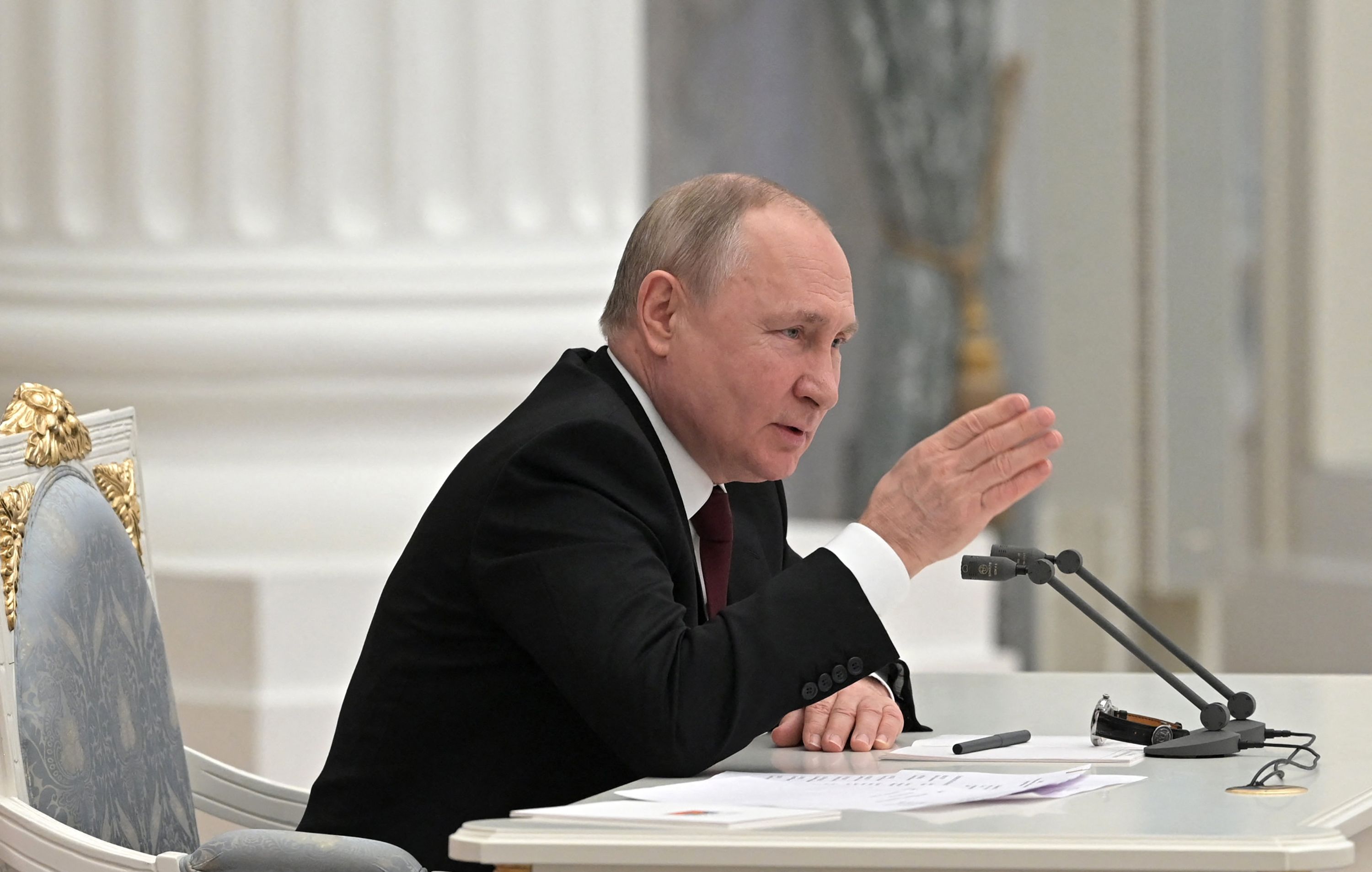 Russian President Vladimir Putin chairs a meeting with members of the Security Council in Moscow on February 21, 2022. - President Vladimir Putin said on February 21, 2022, he would make a decision "today" on recognising the independence of east Ukraine's rebel republics, after Russia's top officials made impassioned speeches in favour of the move. (Photo by Alexey NIKOLSKY / Sputnik / AFP)