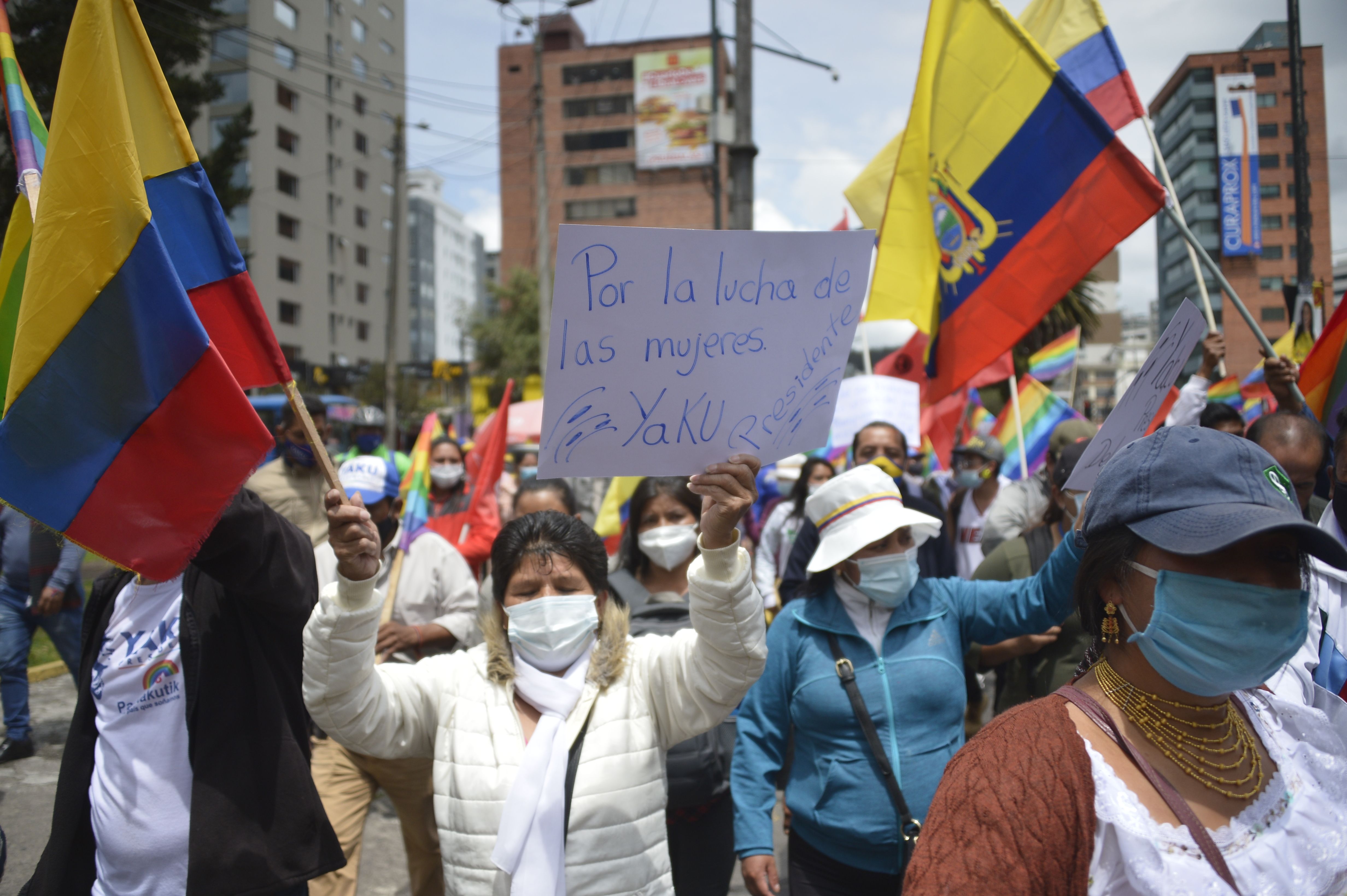 Supporters of the Ecuadorian presidential candidate Yaku Perez take part in a demonstration outside the National Electoral Council in Quito, on February 11, 2021. - Perez, accompanied by his supporters, holds a demonstration against what he called an "injury to the democracy", as he sustained that election fraud was commited after Presidential candidate Guillermo Lasso surpased him. (Photo by Rodrigo BUENDIA / AFP)
