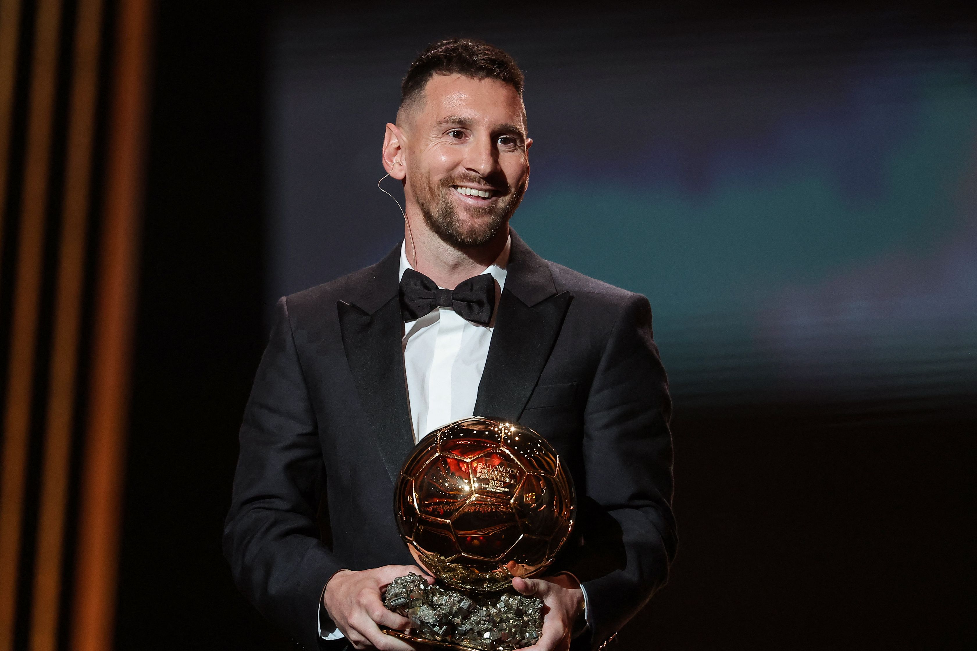 Inter Miami CF's Argentine forward Lionel Messi receives his 8th Ballon d'Or award during the 2023 Ballon d'Or France Football award ceremony at the Theatre du Chatelet in Paris on October 30, 2023. (Photo by FRANCK FIFE / AFP)