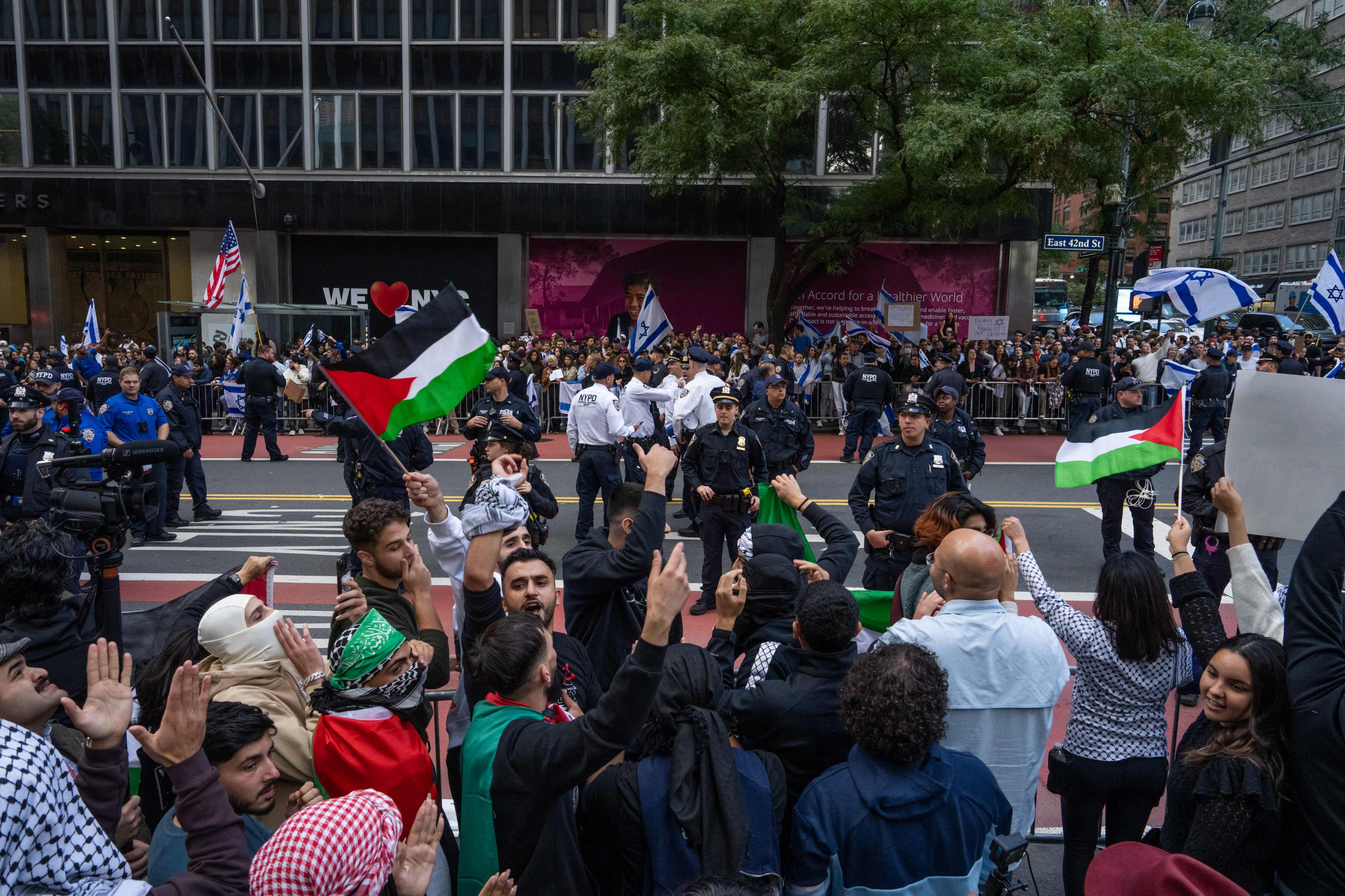 NEW YORK, NEW YORK - OCTOBER 8: Opposing groups protest in support of Palestine and Israel near the Israeli Consulate on October 8, 2023 in New York City. On October 7, the Palestinian militant group Hamas launched a surprise attack on Israel from Gaza by land, sea, and air, killing over 600 people and wounding more than 2000. According to reports, Israeli soldiers and civilians have also been kidnapped by Hamas and taken into Gaza. The attack prompted a declaration of war by Israeli Prime Minister Benjamin Netanyahu, and ongoing retaliatory strikes by Israel on Gaza killing hundreds. Adam Gray/Getty Images/AFP (Photo by Adam Gray / GETTY IMAGES NORTH AMERICA / Getty Images via AFP)