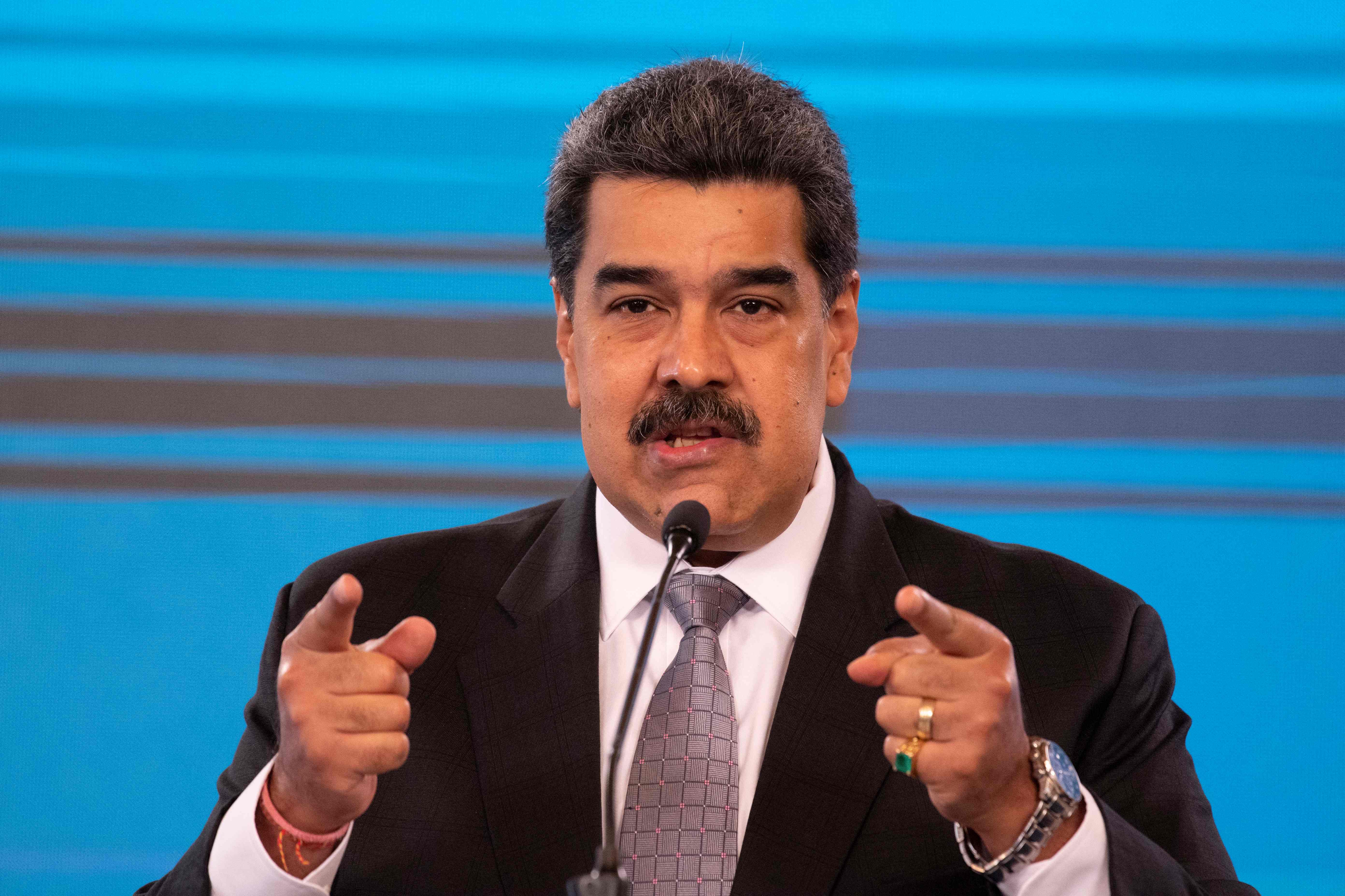 (FILES) In this file photo taken on February 17, 2021 Venezuelan President Nicolas Maduro, gestures while speaking during a press conference at the Miraflores presidential palace in Caracas. - The United States called August 12, 2021 on Venezuelan leader Nicolas Maduro to be "sincere" in working towards new elections if he wants sanctions relief ahead of talks with the opposition in Mexico. (Photo by Yuri CORTEZ / AFP)