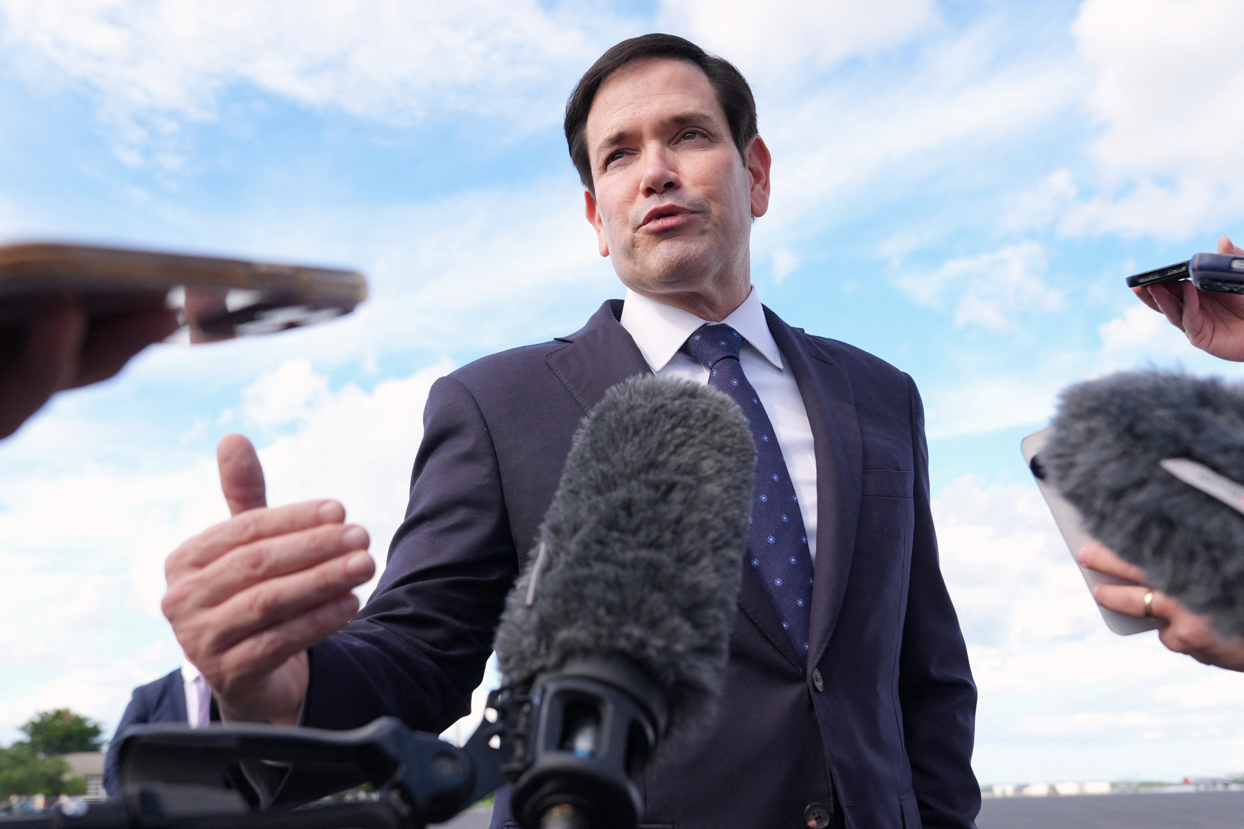 US Secretary of State Marco Rubio speaks to reporters before boarding his plane at Homestead Air Reserve Base in Homestead, Florida, en route to Mexico City, on September 2, 2025. US Secretary of State Marco Rubio headed Tuesday on his first trip in office to Mexico, which has so far succeeded in navigating treacherous terrain with President Donald Trump who wants tough action on migration and cartels. (Photo by Jacquelyn Martin / POOL / AFP)