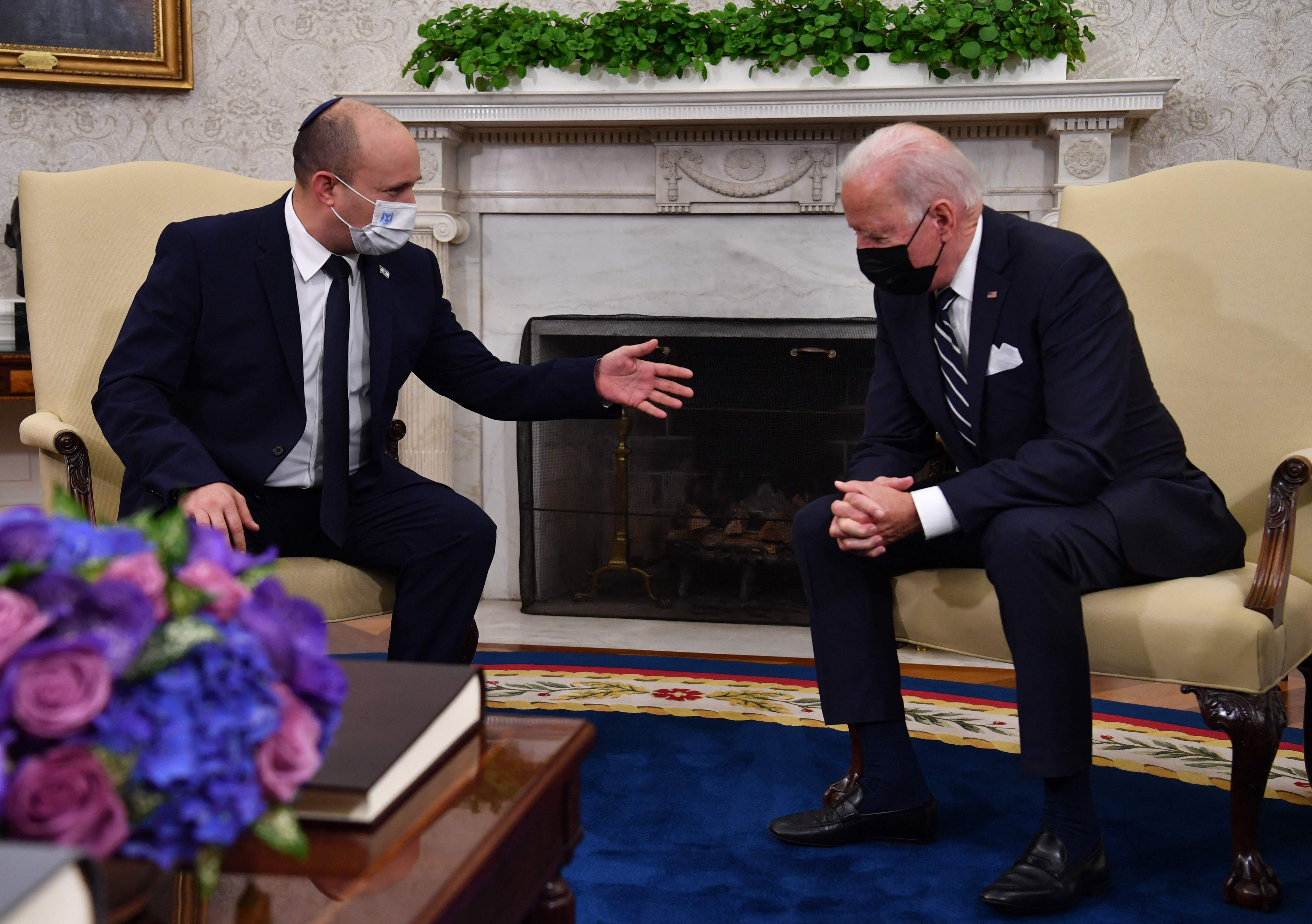 US President Joe Biden meets with Israeli Prime Minister Naftali Bennett in the Oval Office of the White House in Washington, DC, on August 27, 2021. (Photo by Nicholas Kamm / AFP)