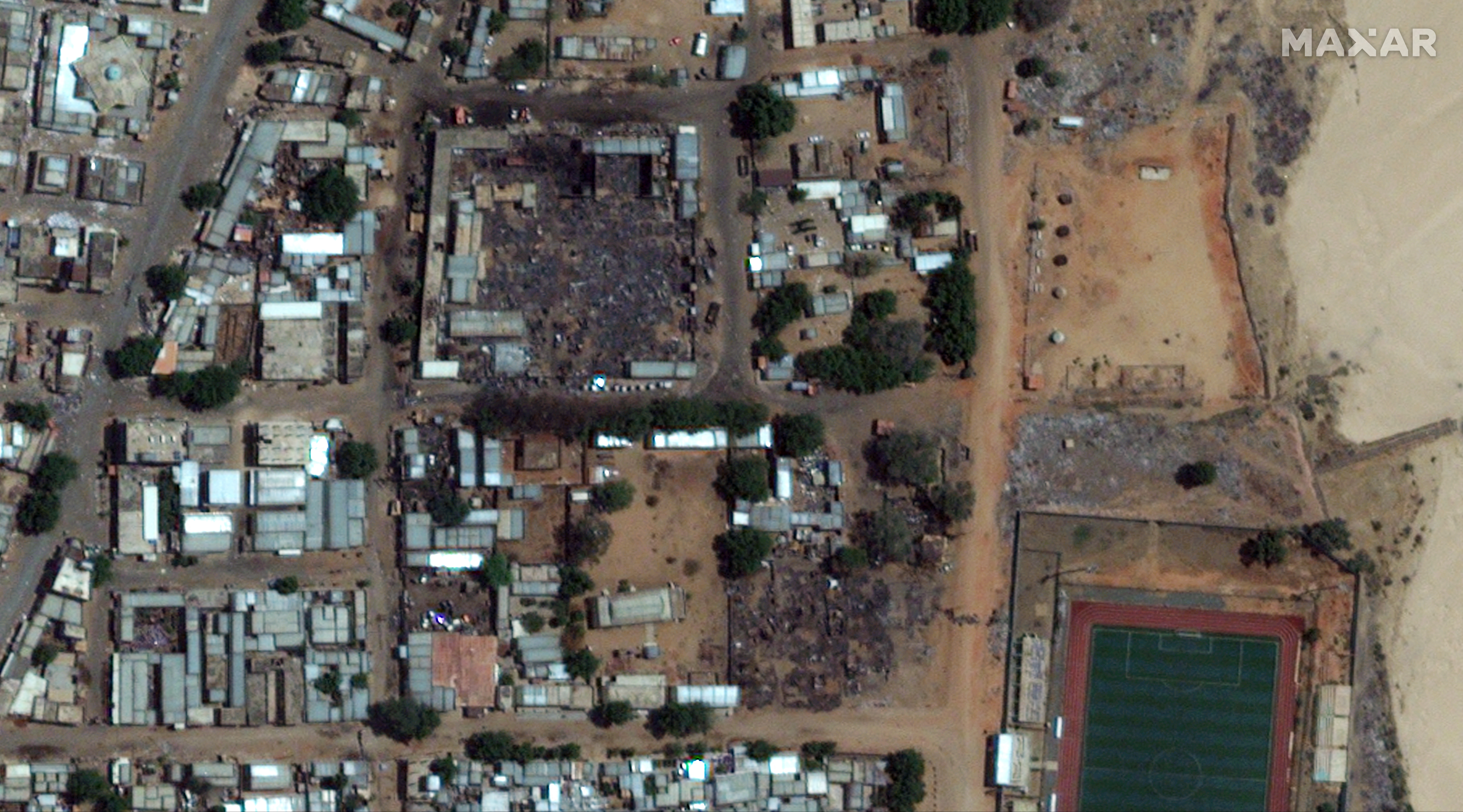 This handout satellite photograph taken on May 17, 2023, and released by Maxar Technologies, shows the market of El Geneina, the capital of West Darfur. Sudan's devastating war raged on into a third month as the reported death toll topped 2,000 and after a state governor was killed in the remote Darfur region. UN aid chief Martin Griffiths, warned that the situation in Darfur was "rapidly spiraling into a humanitarian calamity". (Photo by Satellite image �2023 Maxar Technologies / AFP) / RESTRICTED TO EDITORIAL USE - MANDATORY CREDIT "AFP PHOTO / Satellite image �2023 Maxar Technologies " - NO MARKETING NO ADVERTISING CAMPAIGNS - DISTRIBUTED AS A SERVICE TO CLIENTS