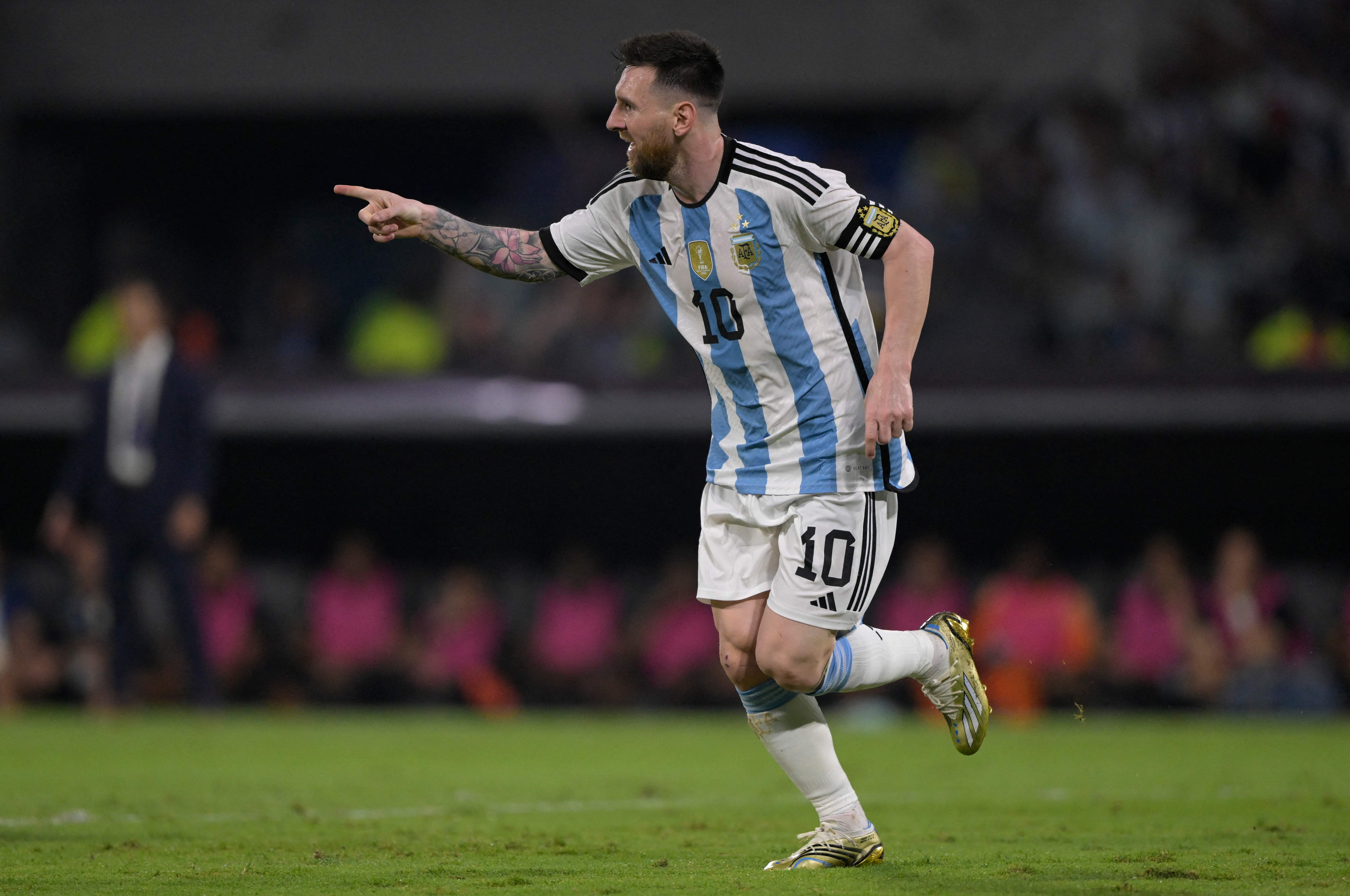 Argentina's forward Lionel Messi celebrates after scoring against Curacao during the friendly football match between Argentina and Curacao at the Madre de Ciudades stadium in Santiago del Estero, in northern Argentina, on March 28, 2023. (Photo by JUAN MABROMATA / AFP)