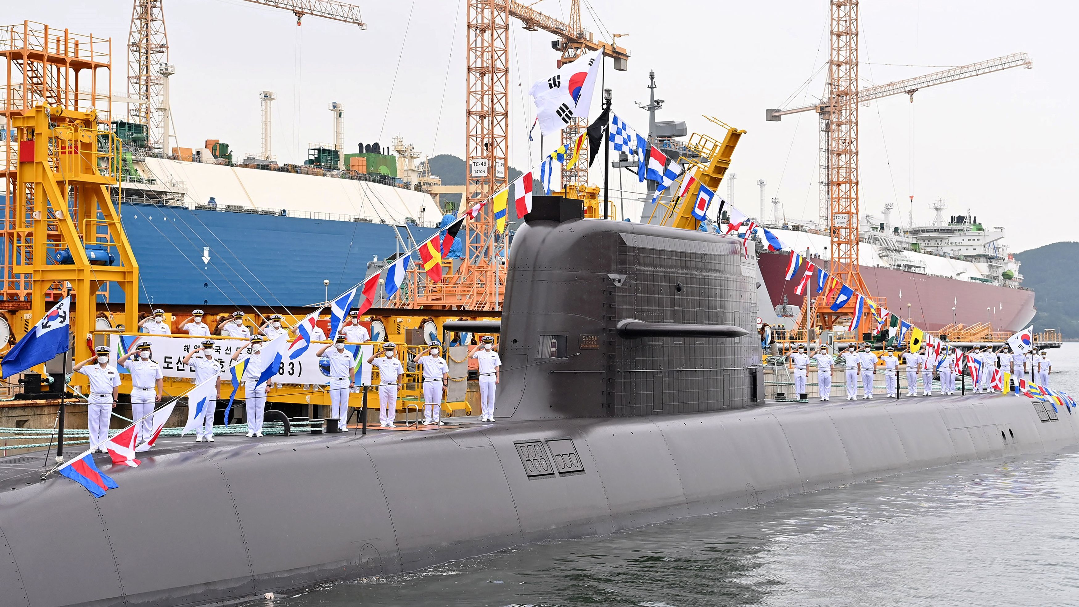 (FILES) This file handout photo taken on August 13, 2021 and provided by South Korea's Defence Ministry on September 7, 2021 shows the locally-developed, diesel-powered 3,000-tonne submarine, named after revered independence activist Ahn Chang-ho, during its commissioning ceremony on the southern island of Geoje. - South Korea successfully test-fired a submarine-launched ballistic missile on September 15, 2021, the presidential Blue House said, becoming only the seventh country in the world with the advanced technology. (Photo by Handout / South Korean Defence Ministry / AFP) / ---- EDITORS NOTE ----- RESTRICTED TO EDITORIAL USE - MANDATORY CREDIT "AFP PHOTO / South Korean Defence Ministry" - NO MARKETING NO ADVERTISING CAMPAIGNS - DISTRIBUTED AS A SERVICE TO CLIENTS