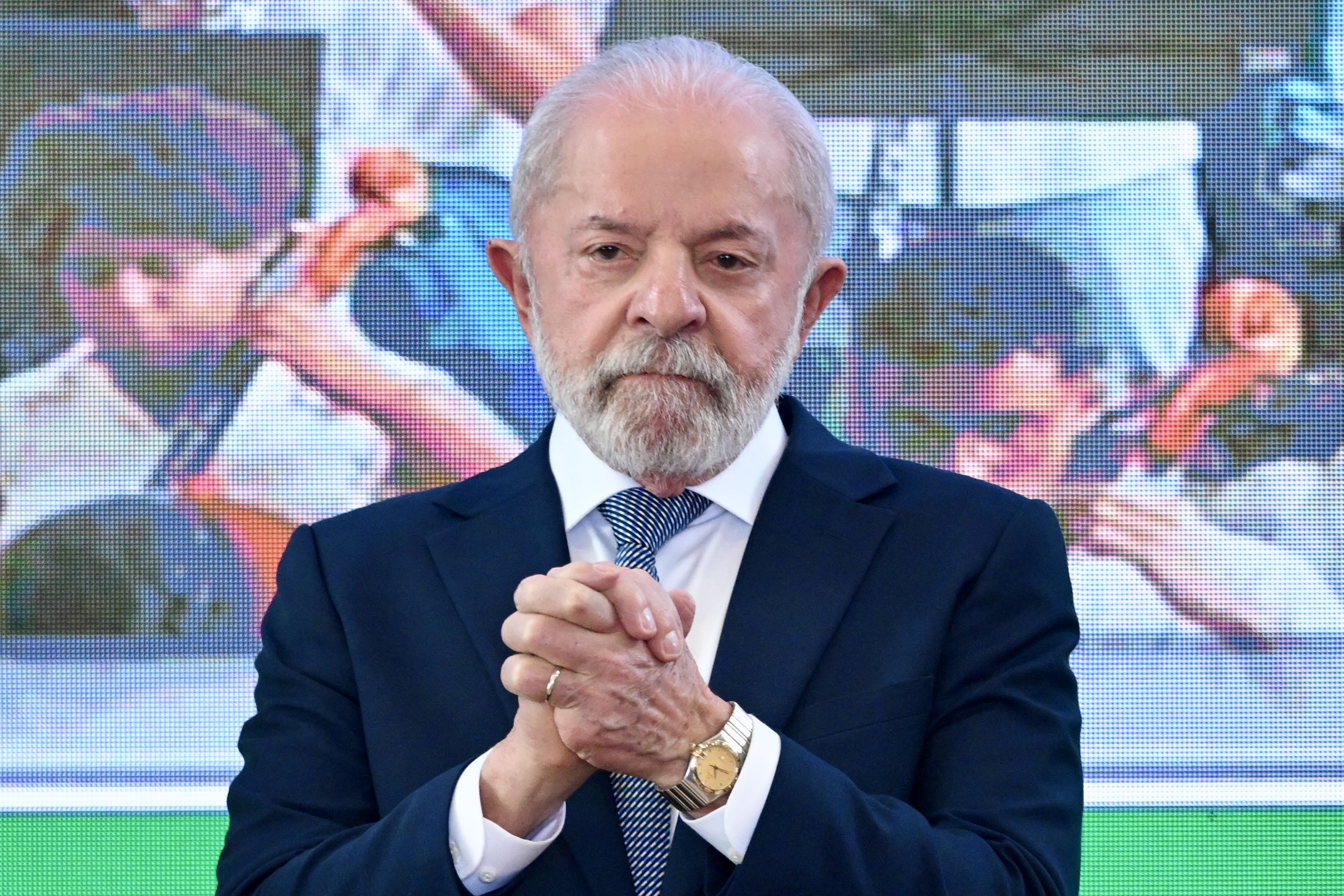 Brazil's President Luiz Inacio Lula da Silva gestures during the meeting of the Council for Sustainable Economic and Social Development in Brasilia on August 5, 2025. (Photo by EVARISTO SA / AFP)