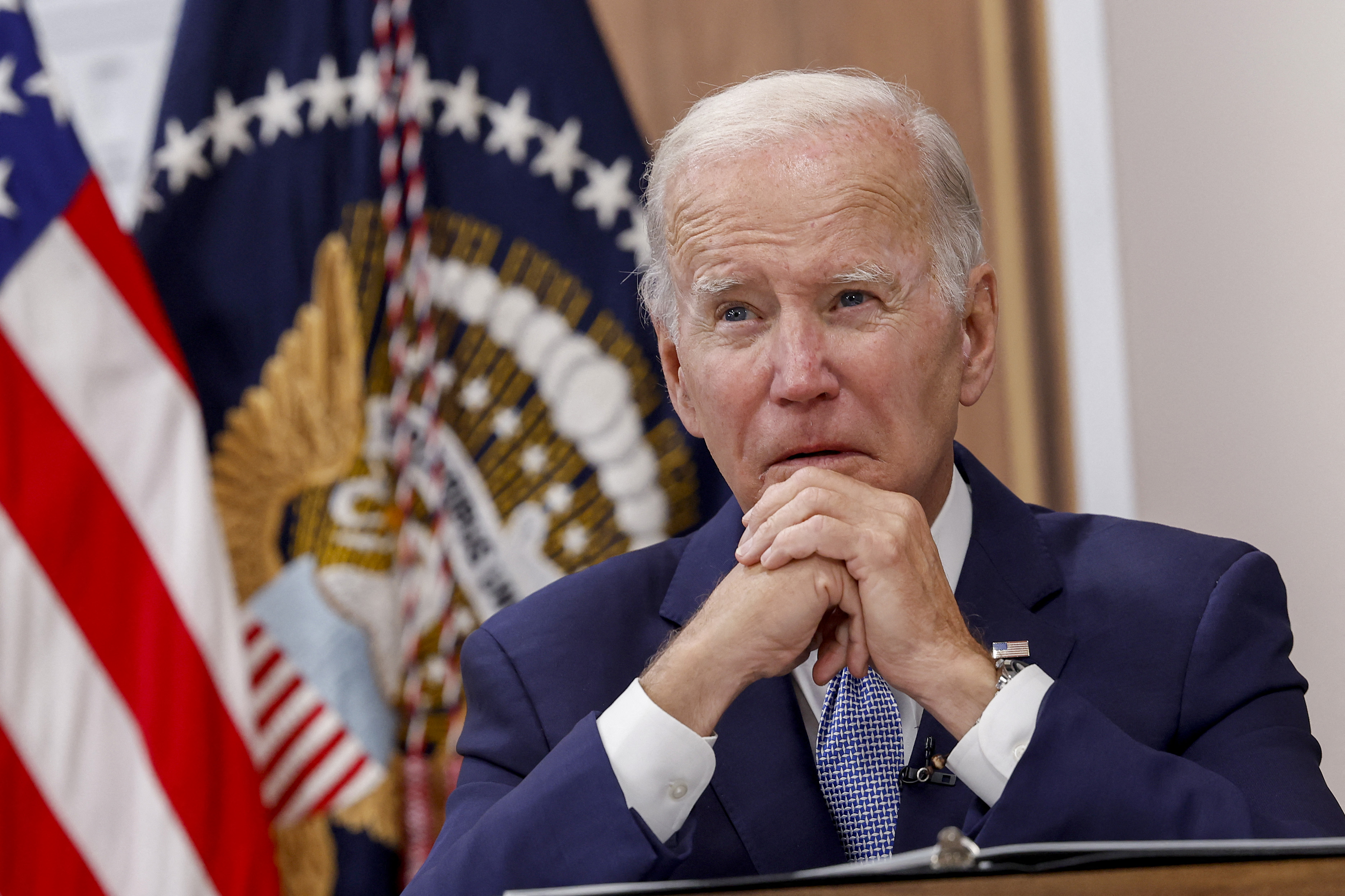 WASHINGTON, DC - JULY 28: U.S. President Joe Biden gives remarks during a meeting on the U.S. Economy with CEOs and members of his Cabinet in the South Court Auditorium of the White House on July 28, 2022 in Washington, DC. During the meeting, President Biden was given a note by an aide which indicated that Creating Helpful Incentives to Produce Semiconductors (CHIPS) for America Act had received enough yes votes in the House of Representatives to pass the legislation. Anna Moneymaker/Getty Images/AFP (Photo by Anna Moneymaker / GETTY IMAGES NORTH AMERICA / Getty Images via AFP)