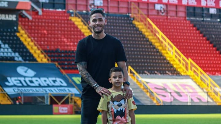 Jonathan Moya con Julián Moya