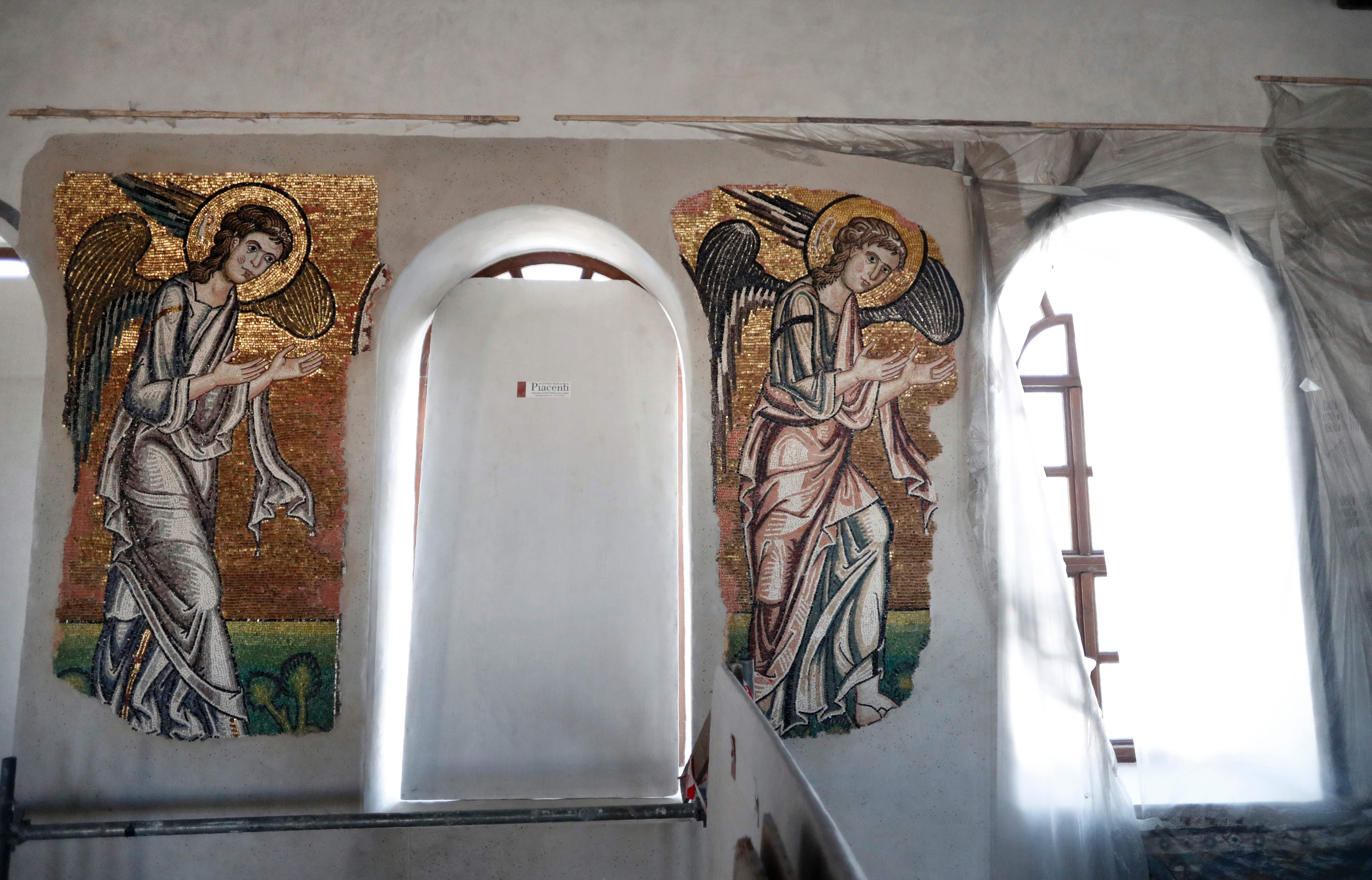 Expertos italianos que trabajan en la restauración de la Basílica de la Natividad, en Belén hallaron esta imagen detrás de un muro de yeso.