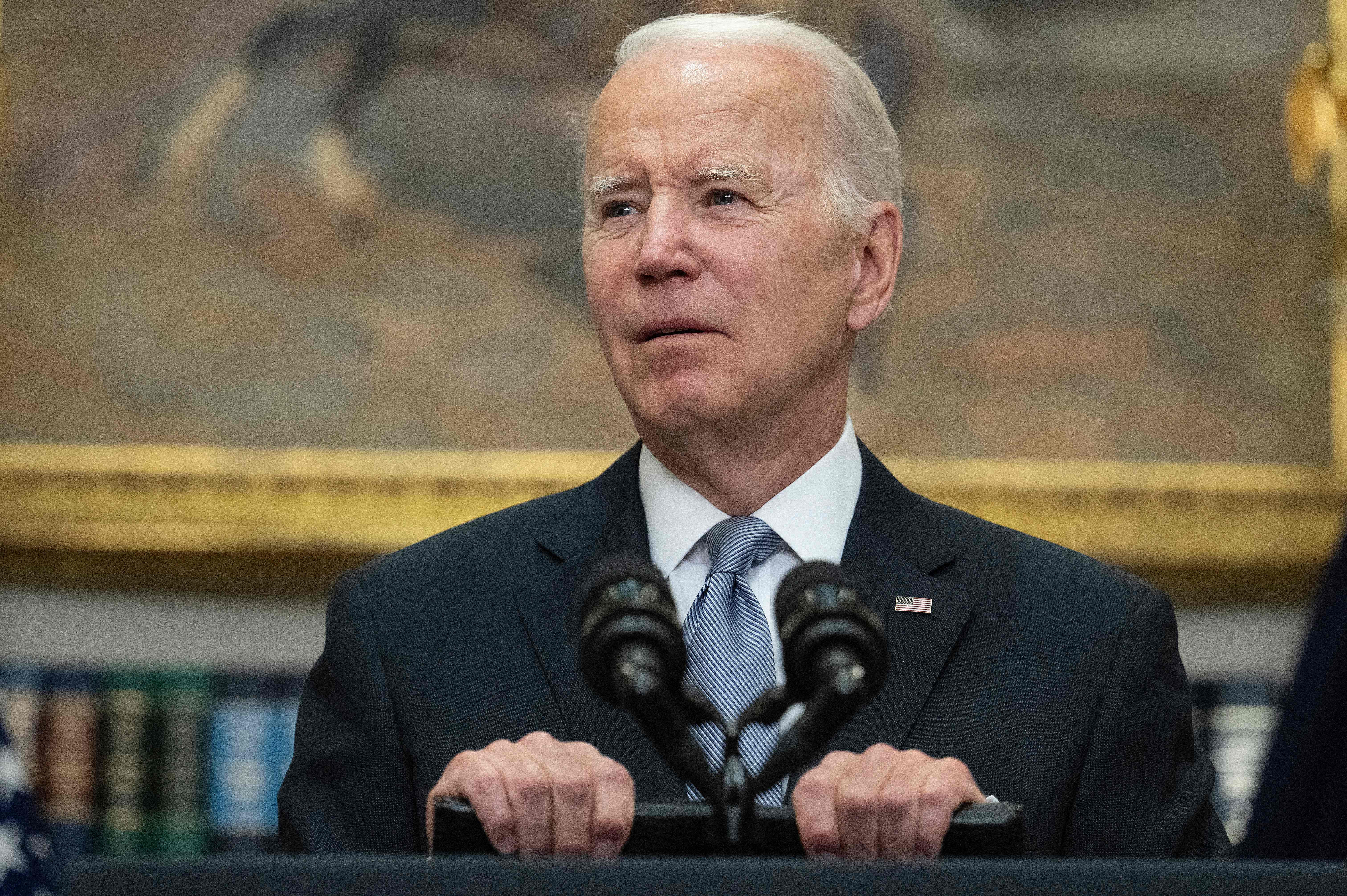 US President Joe Biden provides updates on the Ukraine-Russia conflict in the Roosevelt Room of the White House in Washington, DC, on April 21, 2022. - President Biden on Thursday vowed that Russian President Vladimir Putin would never take control of Ukraine, as the United States announced new military aid for Kyiv. (Photo by Jim WATSON / AFP)