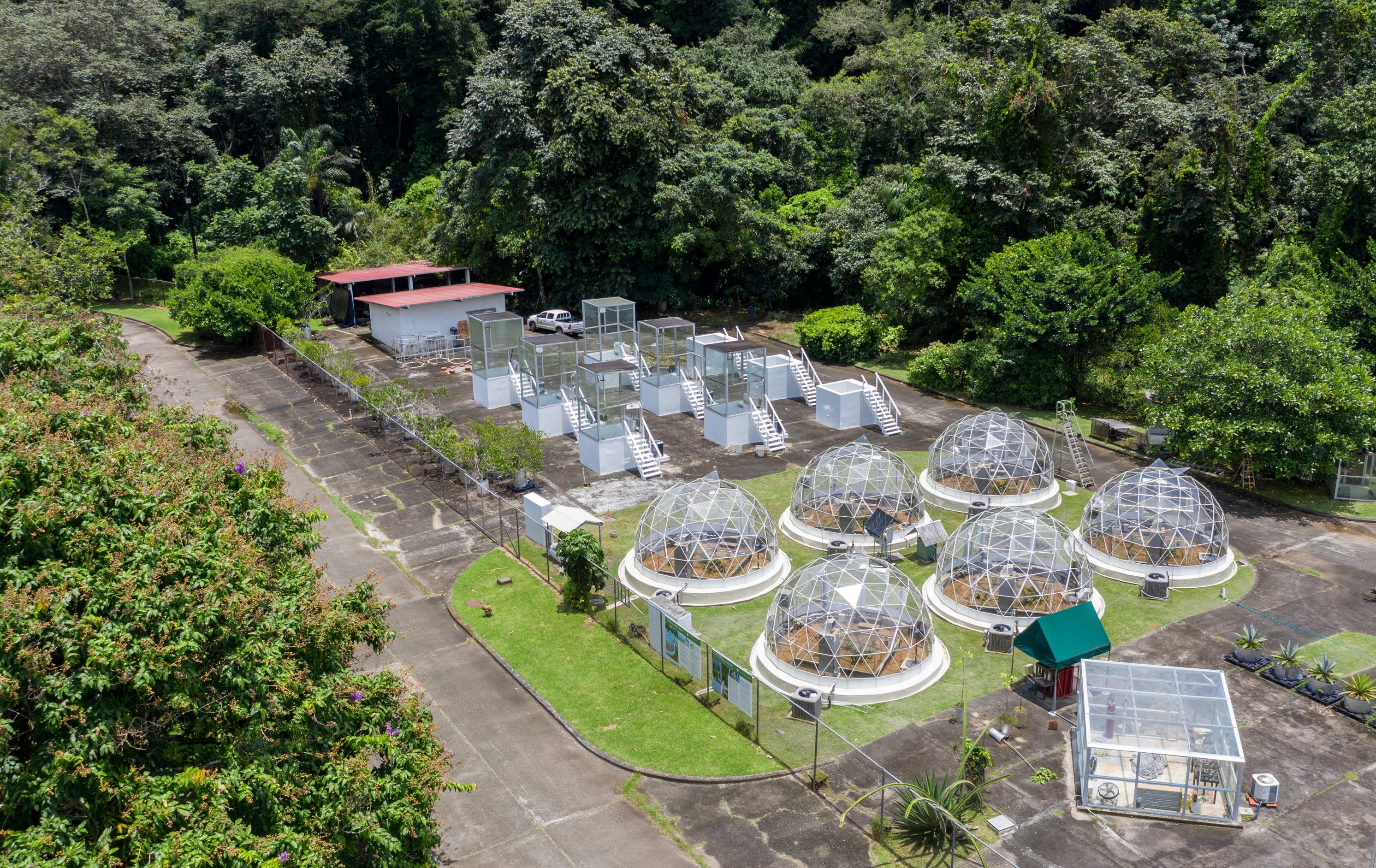 Aerial view of the Smithsonian Tropical Research Institute, in Gamboa, Panama, on September 11, 2019. - The institute is developing a project of tropical domes, where extreme climate scenarios are simulated to see how tropical vegetation behaves. (Photo by Luis ACOSTA / AFP)
