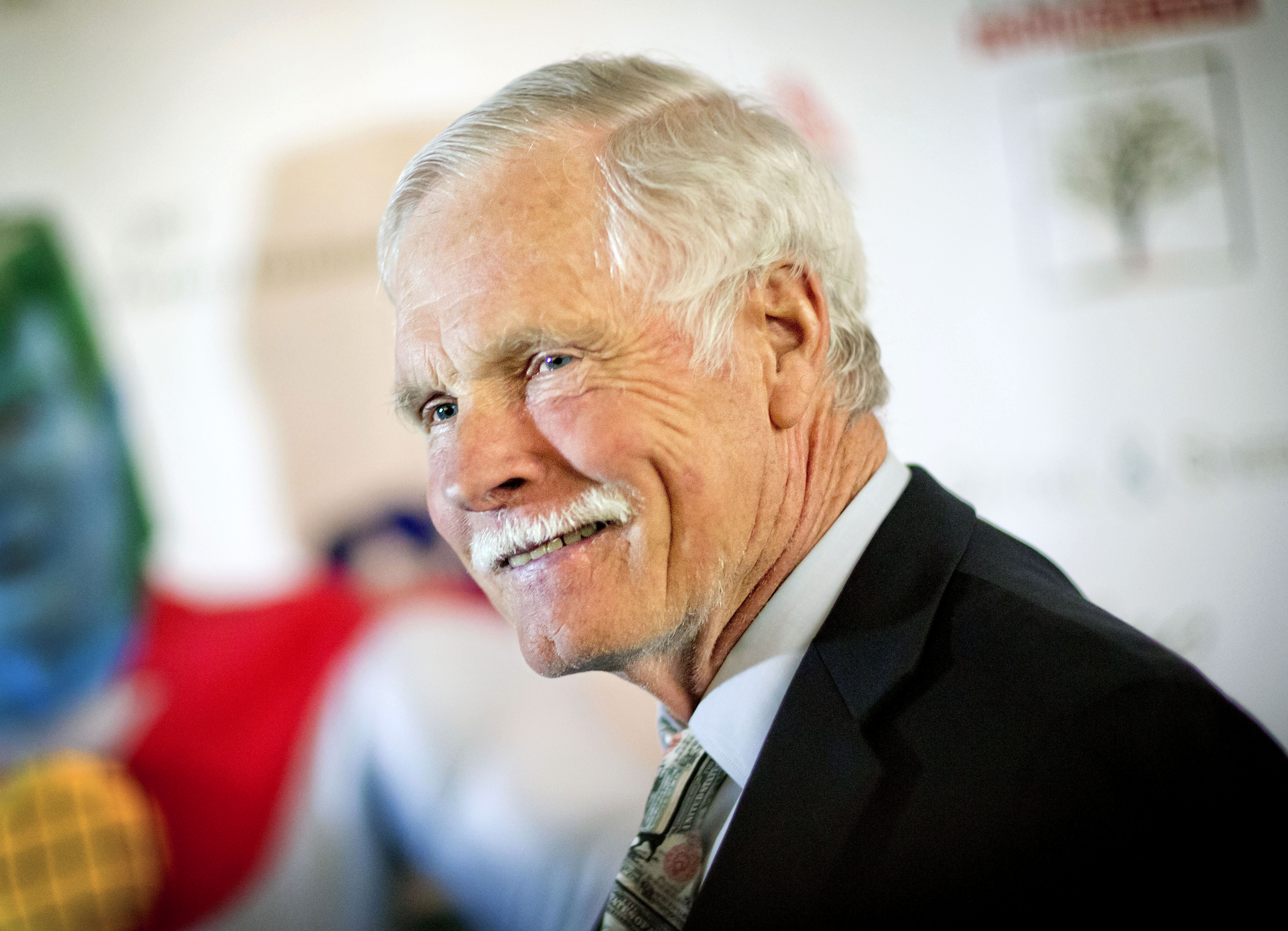 FILE - In this Friday, Dec. 6, 2013 file photo, American media mogul Ted Turner is photographed on the red carpet at the Captain Planet Foundation benefit gala in Atlanta. Turner Enterprises spokesman Phillip Evans in Atlanta said the CNN founder was hospitalized in South America and that "no further details will be provided." CNN's news desk, tweeted that Turner was "under observation" Friday, March 7, 2014, at a hospital in Buenos Aires. (AP Photo/David Goldman, File)
