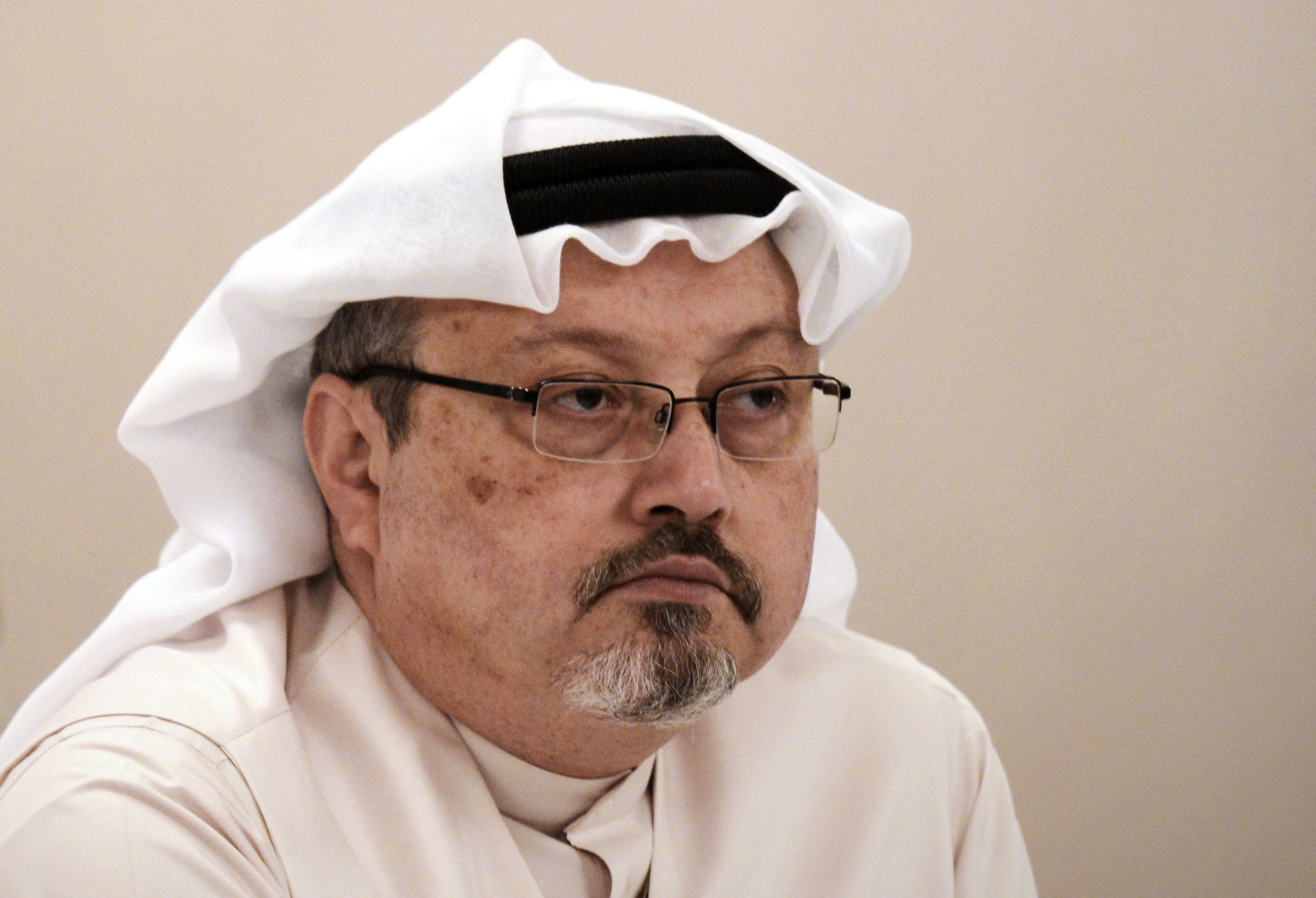 (FILES) In this file photo taken on December 15, 2014 (FILES) In this file photo taken on December 15, 2014 Saudi journalist Jamal Khashoggi attends a press conference in the Bahraini capital Manama. - The US director of national intelligence is expected to release a damning report today on February 26, 2021 that fingers Saudi Crown Prince Mohammed bin Salman for the brutal murder and dismemberment of dissident journalist Jamal Khashoggi in October 2018. (Photo by MOHAMMED AL-SHAIKH / AFP)