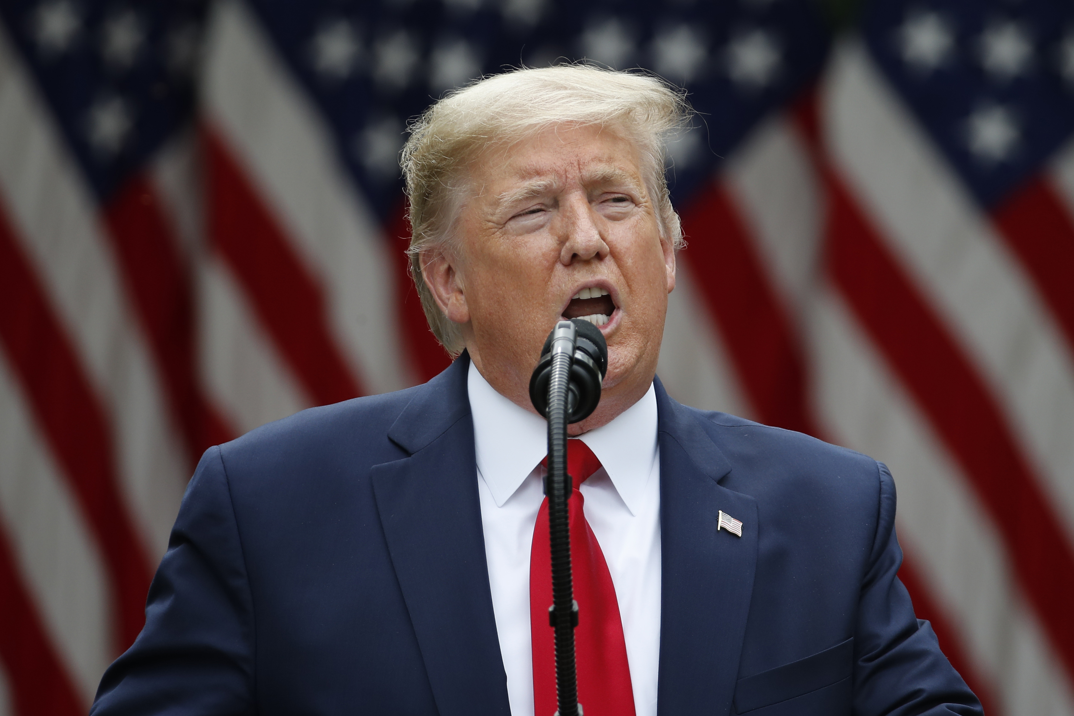 President Donald Trump leaves after speaking in the Rose Garden of the White House, Friday, May 29, 2020, in Washington. (AP Photo/Alex Brandon)