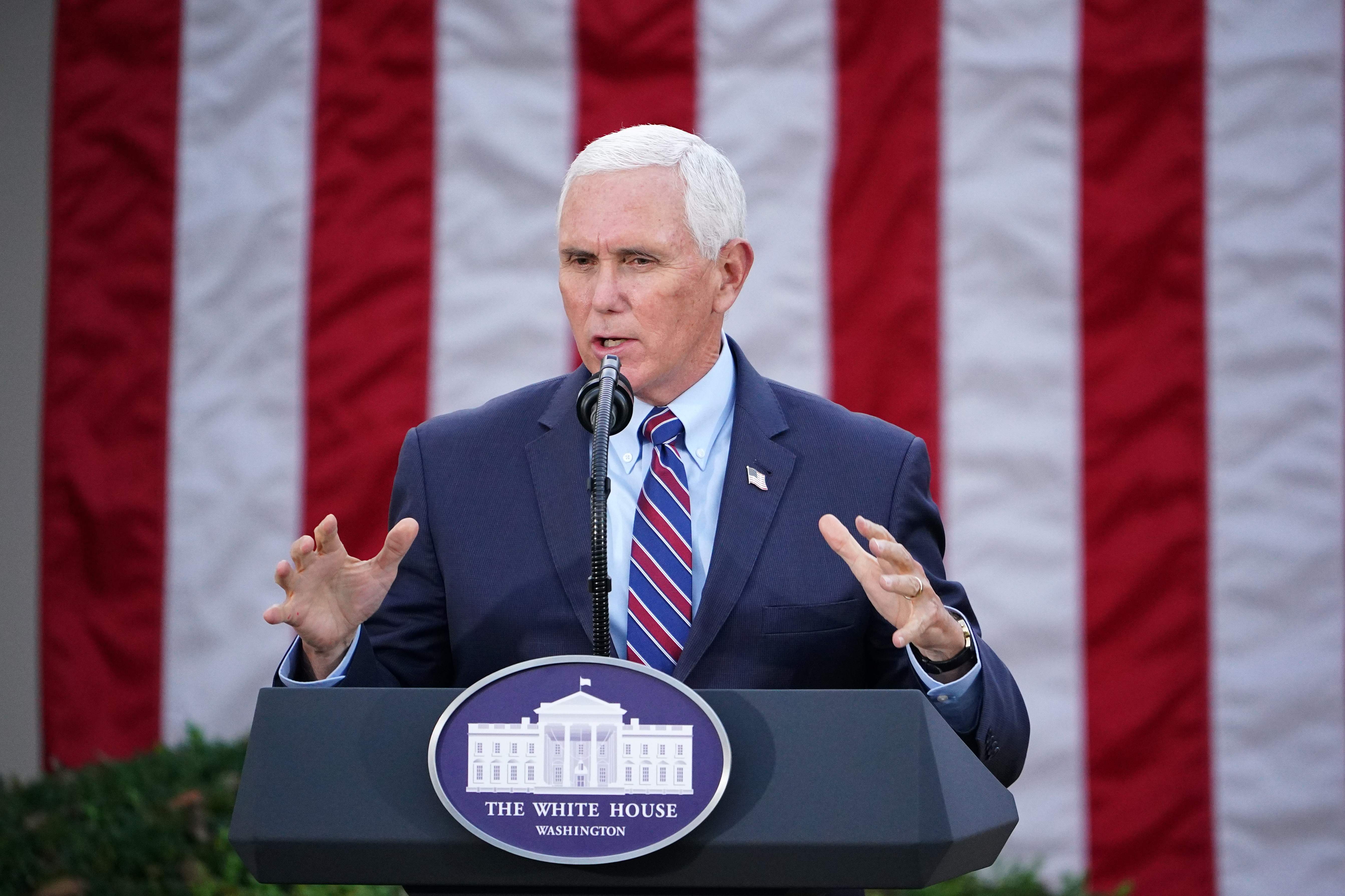 (FILES) In this file photo taken on November 13, 2020 US Vice President Mike Pence delivers an update on "Operation Warp Speed" in the Rose Garden of the White House in Washington, DC. - US Vice President Mike Pence on January 12, 2021, told House leaders he does not support invoking the 25th Amendment process to remove Donald Trump, all but guaranteeing an imminent impeachment vote against the president. (Photo by MANDEL NGAN / AFP)