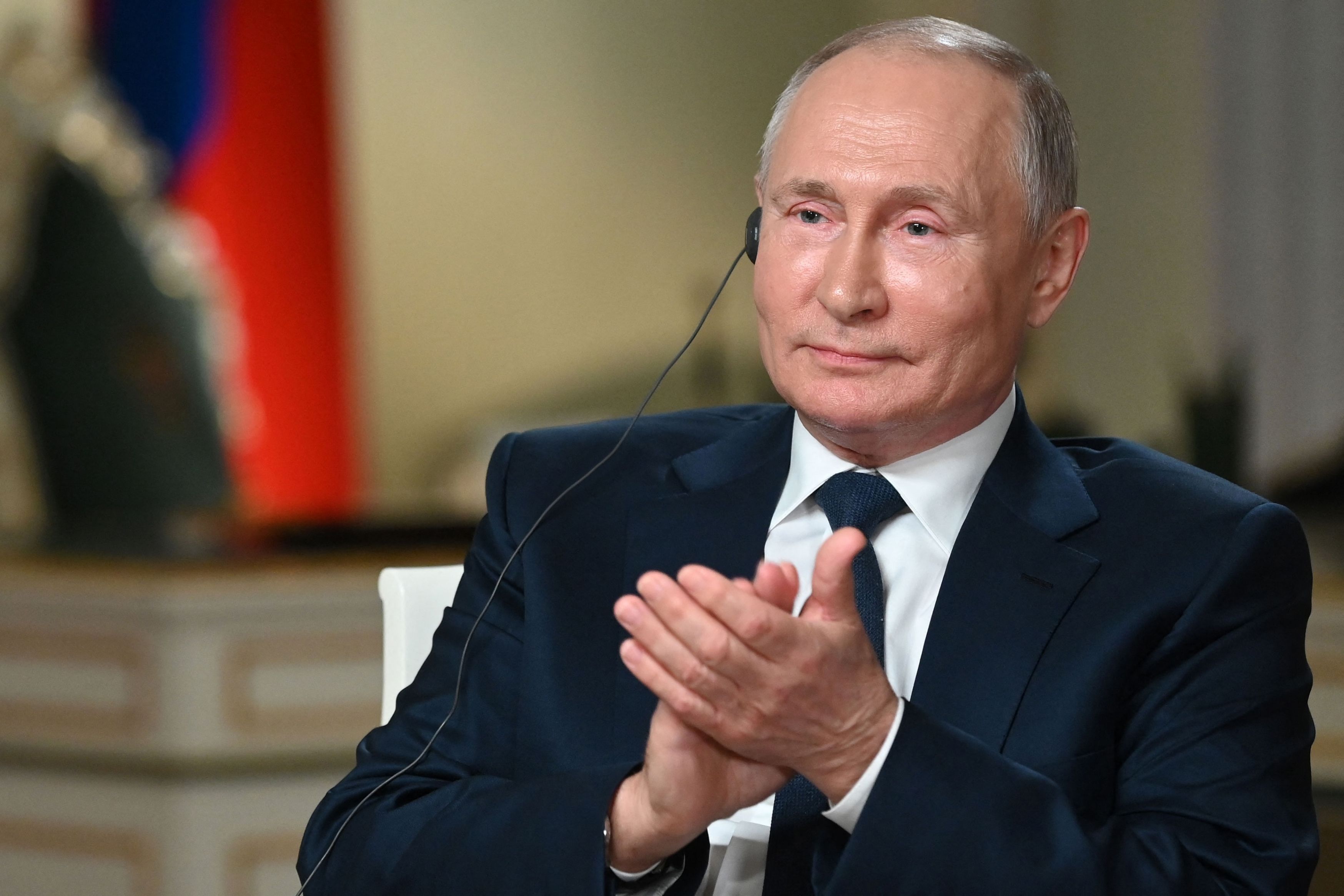 Russia's President Vladimir Putin (R) speaks with journalist of NBC News Keir Simmons in Moscow on June 11, 2021, during an exclusive interview ahead of a meeting with US President. (Photo by Maxim Blinov / SPUTNIK / AFP)