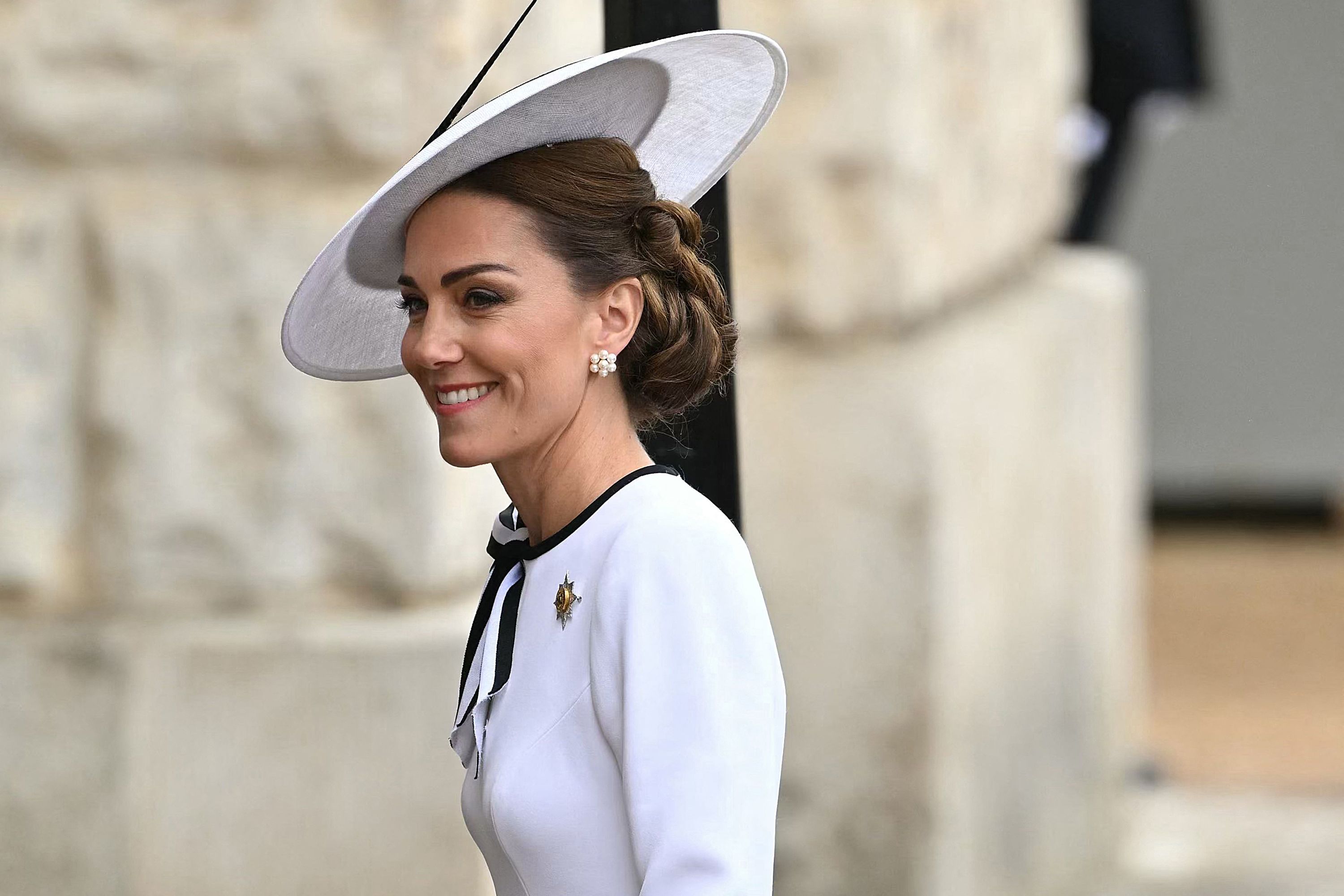 Britain's Catherine, Princess of Wales, arrives to Horse Guards Parade for the King's Birthday Parade "Trooping the Colour" in London on June 15, 2024. Catherine, Princess of Wales, is making a tentative return to public life for the first time since being diagnosed with cancer, attending the Trooping the Colour military parade in central London. (Photo by JUSTIN TALLIS / AFP)
