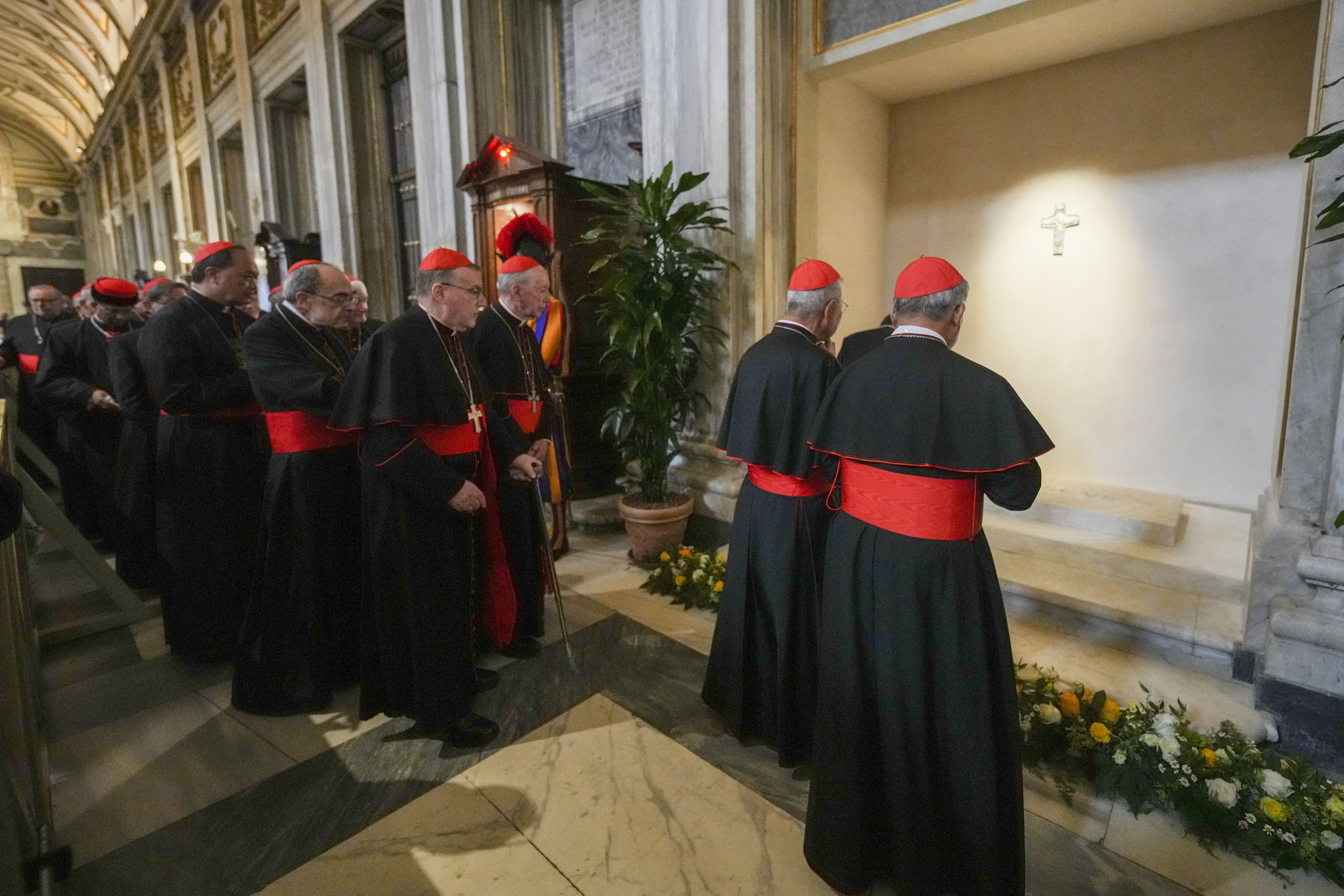 Cardinals visit the tomb of late Pope Francis at Santa Maria Maggiore Basilica a day after the Pope's funeral, in Rome on April 27, 2025. (Photo by Andrew Medichini / POOL / AFP)