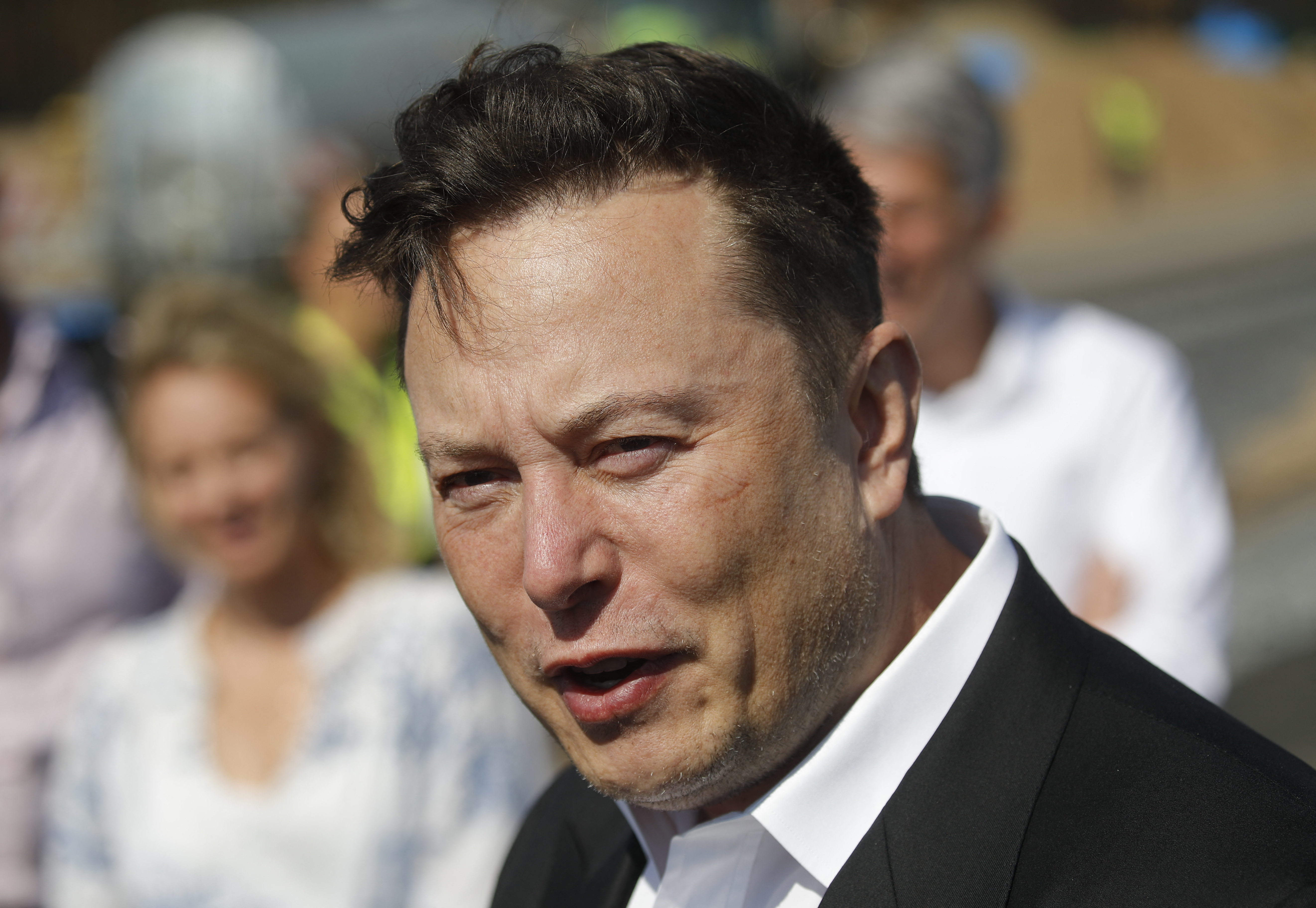 (FILES) In this file photo taken on September 3, 2020 Tesla CEO Elon Musk talks to media as he arrives to visit the construction site of the future US electric car giant Tesla, in Gruenheide near Berlin. - Elon Musk's lawyers have filed a fresh notice to terminate his $44 billion buyout of Twitter, citing whistleblower testimony by the platform's former security chief as "distinct" justification for scrapping the deal. (Photo by Odd ANDERSEN / AFP)