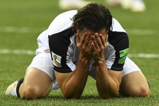 Costa Rica's defender Bryan Oviedo reacts during the Russia 2018 World Cup Group E football match between Switzerland and Costa Rica at the Nizhny Novgorod Stadium in Nizhny Novgorod on June 27, 2018. / AFP PHOTO / Martin BERNETTI / RESTRICTED TO EDITORIAL USE - NO MOBILE PUSH ALERTS/DOWNLOADS