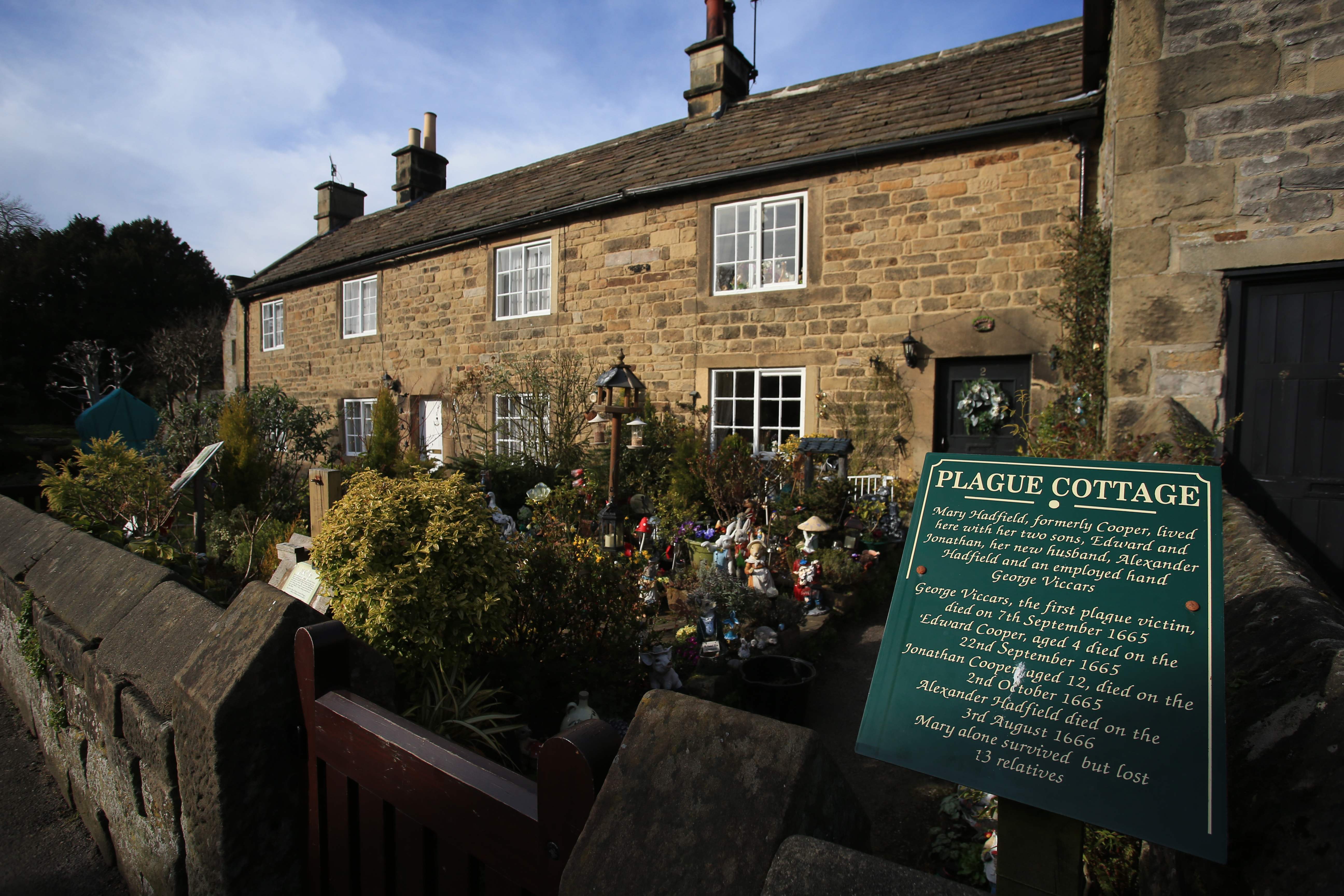The plague cottage where families lost their lives in the 17th century Great Plague is seen in the village of Eyam in Derbyshire, northern England on March 23, 2020. - In the 17th century, the inhabitants of Eyam got rid of the plague by placing themselves in quarantine. In recent more days, in the midst of the novel coronavirus pandemic, this village in central England has seen red in the face of an influx of visitors defying health recommendations. (Photo by Lindsey Parnaby / AFP) / TO GO WITH AFP STORY BY LINDSEY PARNABY AND SYLVAIN PEUCHMAURD