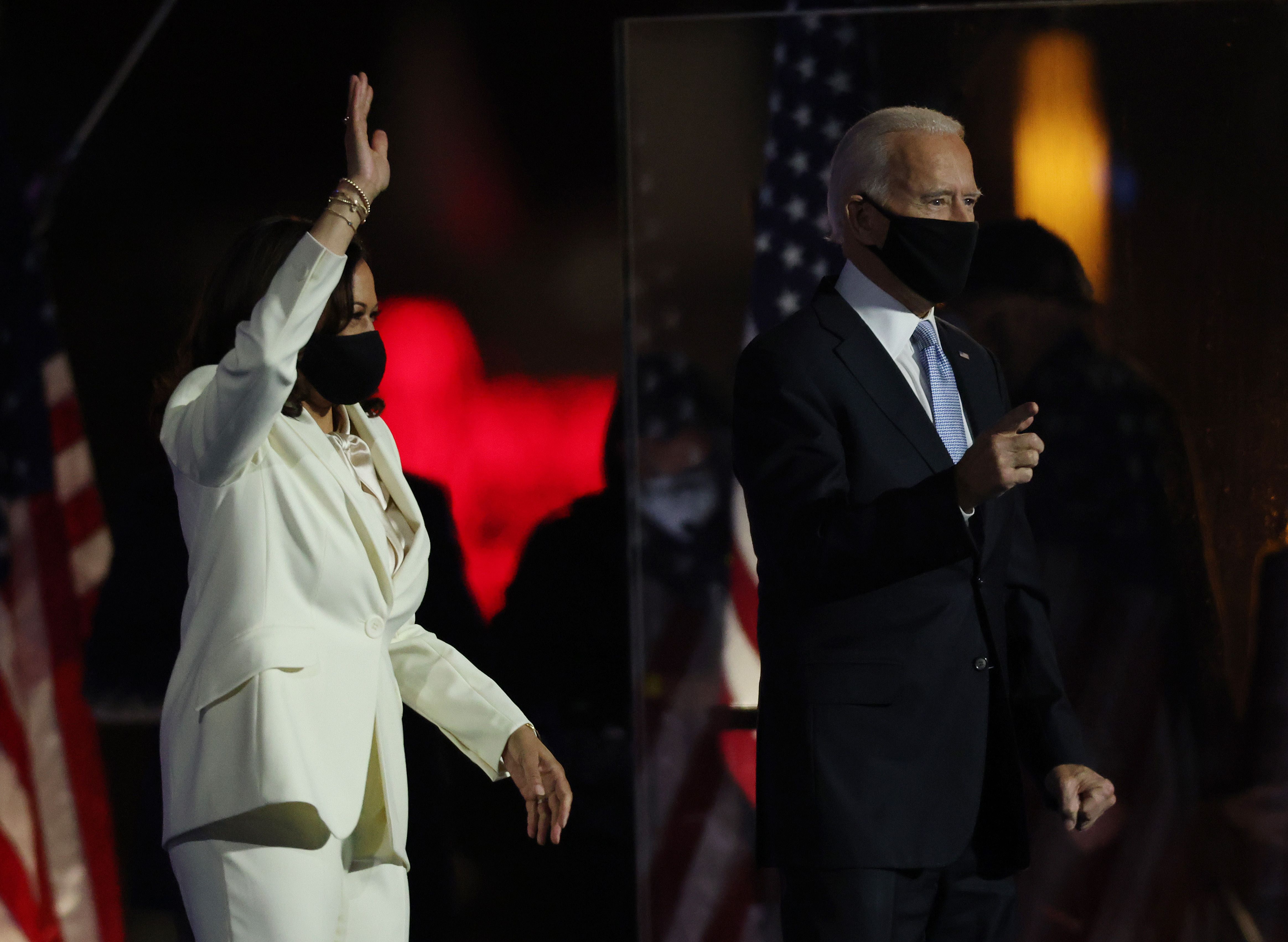 WILMINGTON, DELAWARE - NOVEMBER 07: President-elect Joe Biden and Vice President-elect Kamala Harris take the stage at the Chase Center to address the nation November 07, 2020 in Wilmington, Delaware. After four days of counting the high volume of mail-in ballots in key battleground states due to the coronavirus pandemic, the race was called for Biden after a contentious election battle against incumbent Republican President Donald Trump. Win McNamee/Getty Images/AFP
== FOR NEWSPAPERS, INTERNET, TELCOS & TELEVISION USE ONLY ==