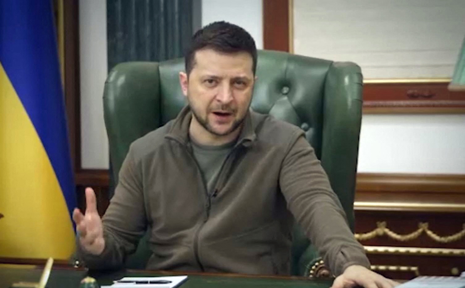 (FILES) In this file photo taken on March 12, 2022 this handout video grab taken and released by the Ukraine Presidency press service shows Ukrainian President Volodymyr Zelensky speaking in capital Kyiv. - Ukraine's President Volodymyr Zelensky will deliver a virtual address to Congress on March 16, 2022 as the western ally comes under intense shelling from Russia, Democratic leadership in the US Congress said Wednesday. (Photo by Handout / UKRAINE PRESIDENCY / AFP) / RESTRICTED TO EDITORIAL USE - MANDATORY CREDIT "AFP PHOTO /UKRAINIAN PRESIDENCY PRESS OFFICE " - NO MARKETING - NO ADVERTISING CAMPAIGNS - DISTRIBUTED AS A SERVICE TO CLIENTS