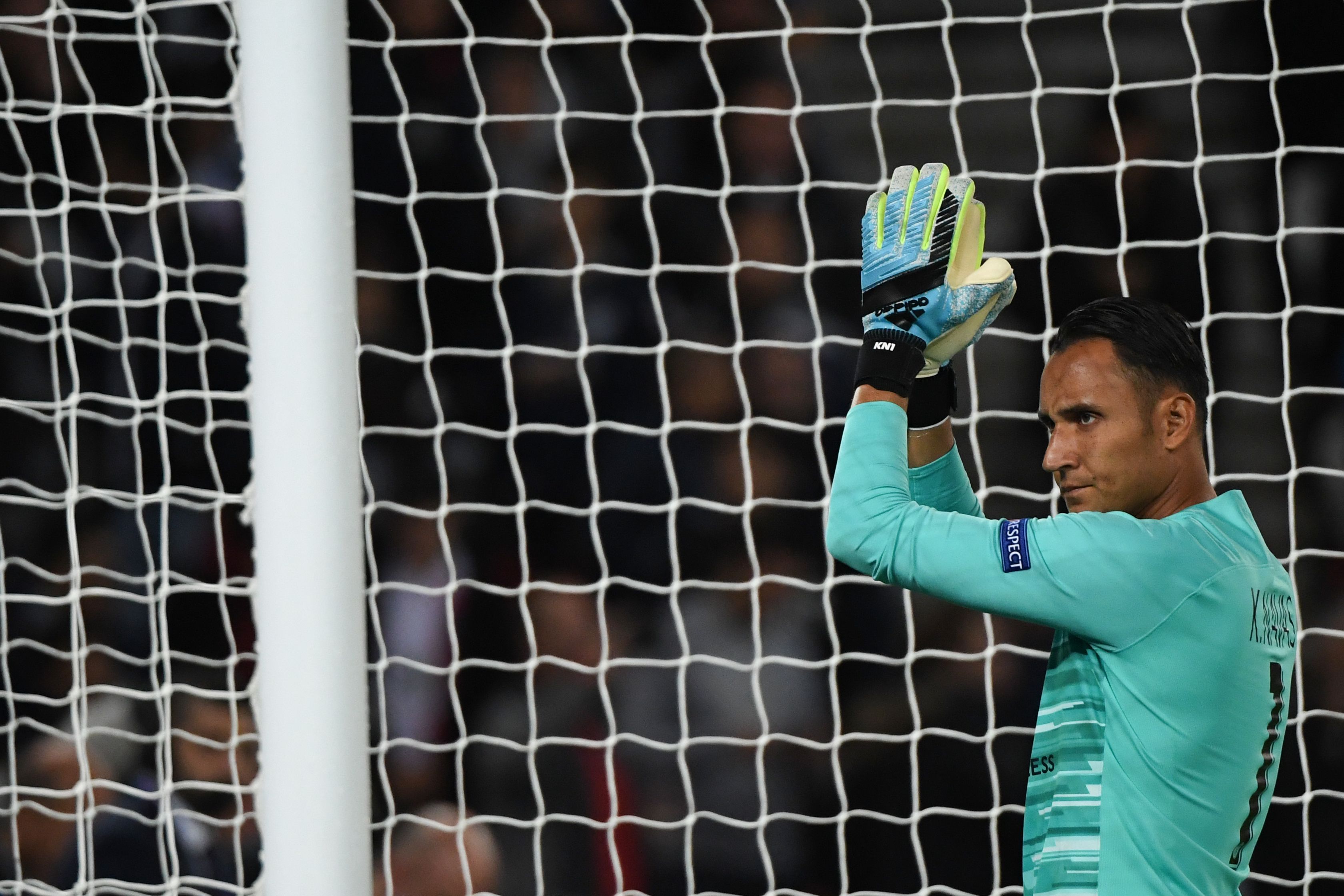 Paris Saint-Germain's Costa Rican Keylor Navas applauds at the start of the UEFA Champions league Group A football match between Paris Saint-Germain and Real Madrid, at the Parc des Princes stadium, in Paris, on September 18, 2019. (Photo by MARTIN BUREAU / AFP)