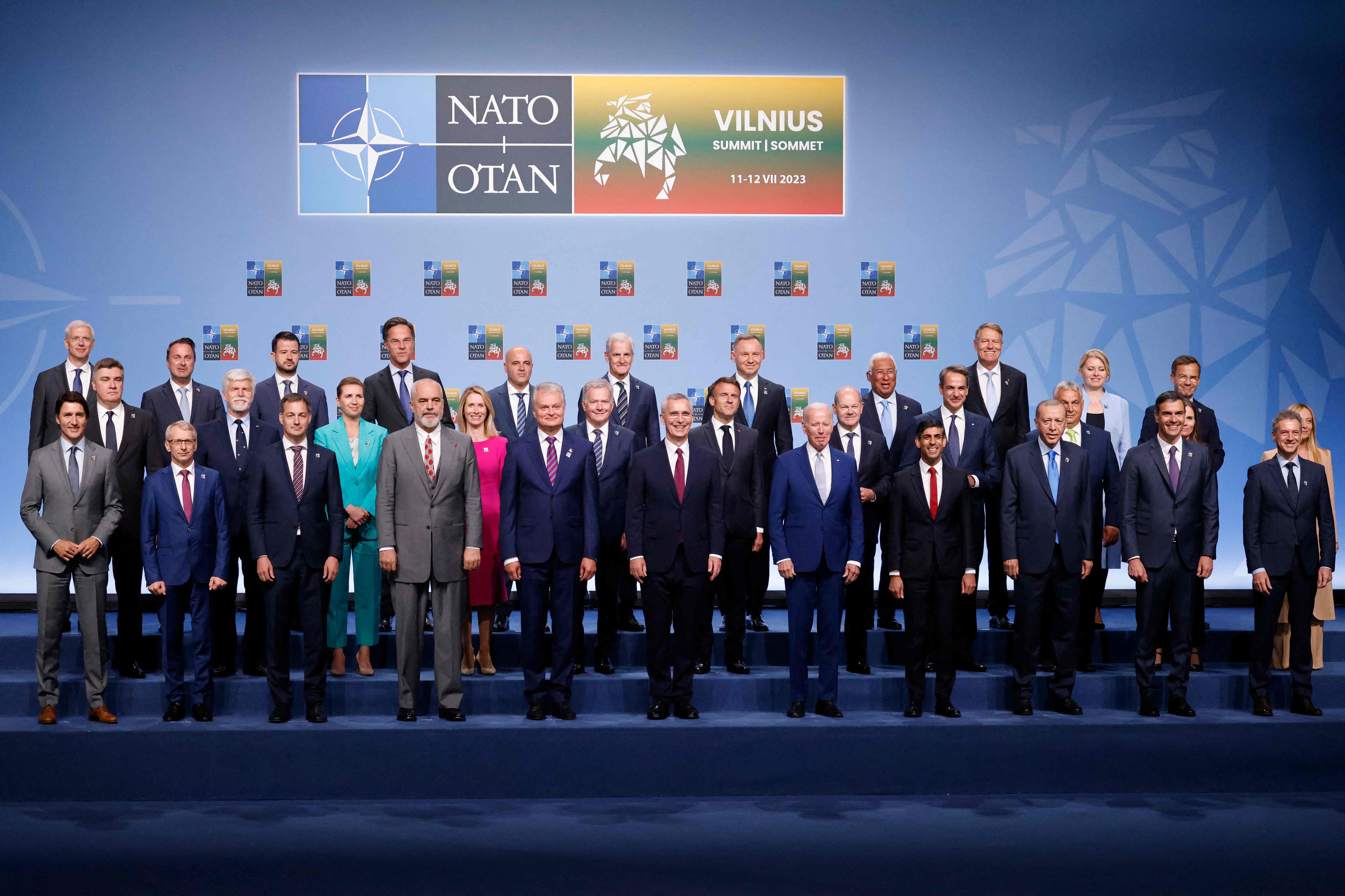 TOPSHOT - (L/R) Lithuania's President Gitanas Nauseda (CL), NATO Secretary General Jens Stoltenberg (CR) and NATO Foreign Ministers pose for a family photograph during the NATO summit, in Vilnius on July 11, 2023. NATO leaders will grapple with Ukraine's membership ambitions at their summit on July 11, 2023, their determination to face down Russia boosted by a breakthrough in Sweden's bid to join the alliance. (Photo by Ludovic MARIN / POOL / AFP) / SOLELY FOR SIPA