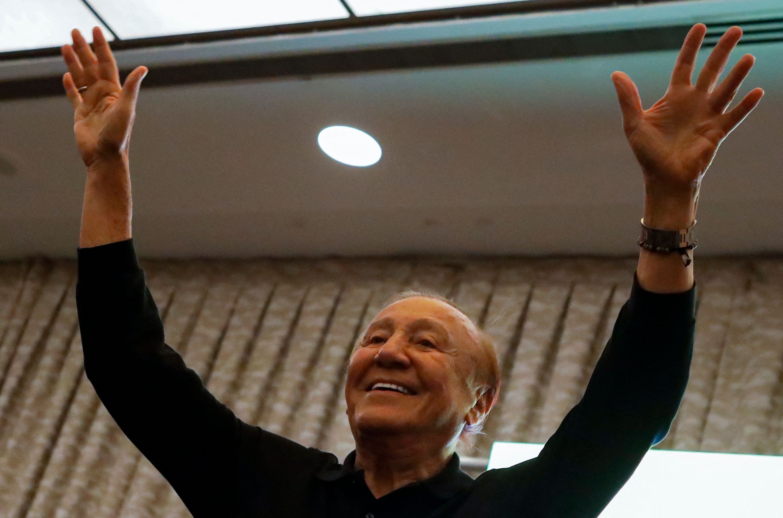 Colombian presidential candidate Rodolfo Hernandez greets supporters during a gathering with the Colombian community in Miami, Florida, on June 9, 2022. - Colombian presidential candidate Rodolfo Hernandez on Thursday said he was calling off his remaining pre-election events 10 days ahead of the poll due to his life being "at risk."
The 77-year-old millionaire outsider faces a run-off against leftist former guerrilla Gustavo Petro on June 19, after upsetting projections in last month's first round to finish in the top two. (Photo by Eva Marie UZCATEGUI / AFP)