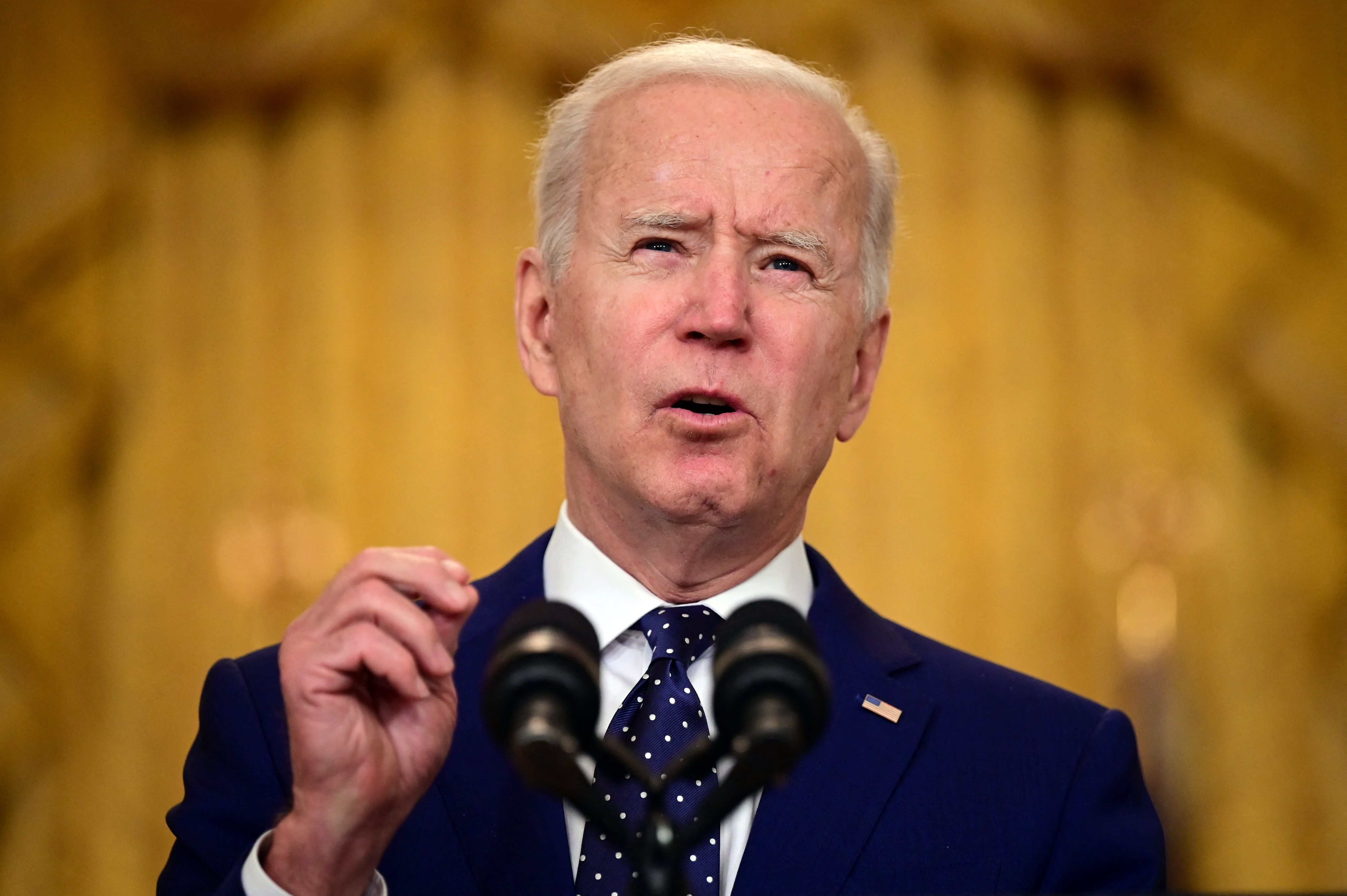 US President Joe Biden delivers remarks on Russia at the White House in Washington, DC on April 15, 2021. - The United States announced sanctions and the expulsion of 10 Russian diplomats Thursday in retaliation for what Washington says is the Kremlin's US election interference, a massive cyberattack and other hostile activity. (Photo by JIM WATSON / AFP)
