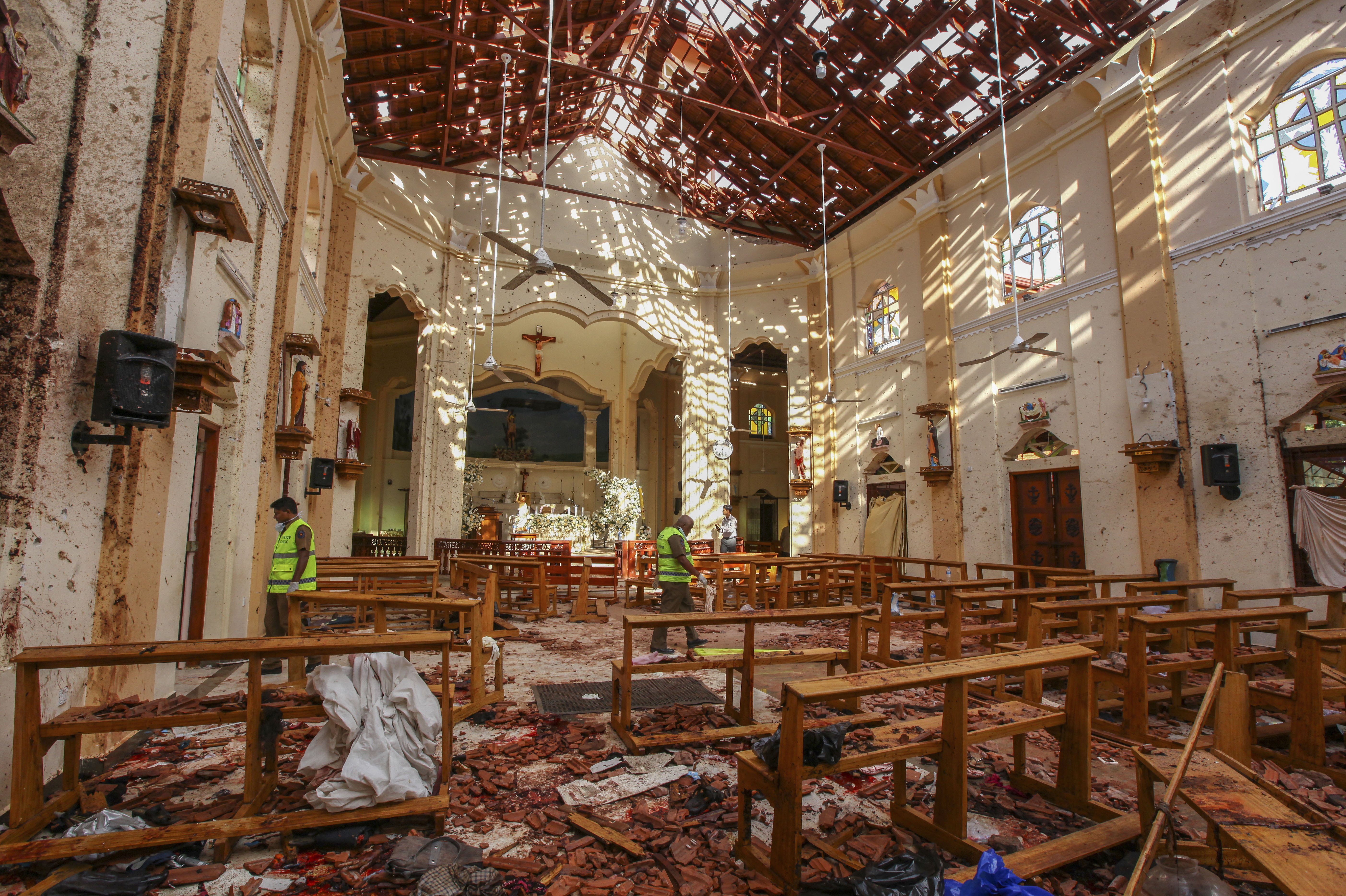 A view of St. Sebastian's Church damaged in blast in Negombo, north of Colombo, Sri Lanka, Sunday, April 21, 2019. More than hundred were killed and hundreds more hospitalized with injuries from eight blasts that rocked churches and hotels in and just outside of Sri Lanka's capital on Easter Sunday, officials said, the worst violence to hit the South Asian country since its civil war ended a decade ago. (AP Photo/Chamila Karunarathne)