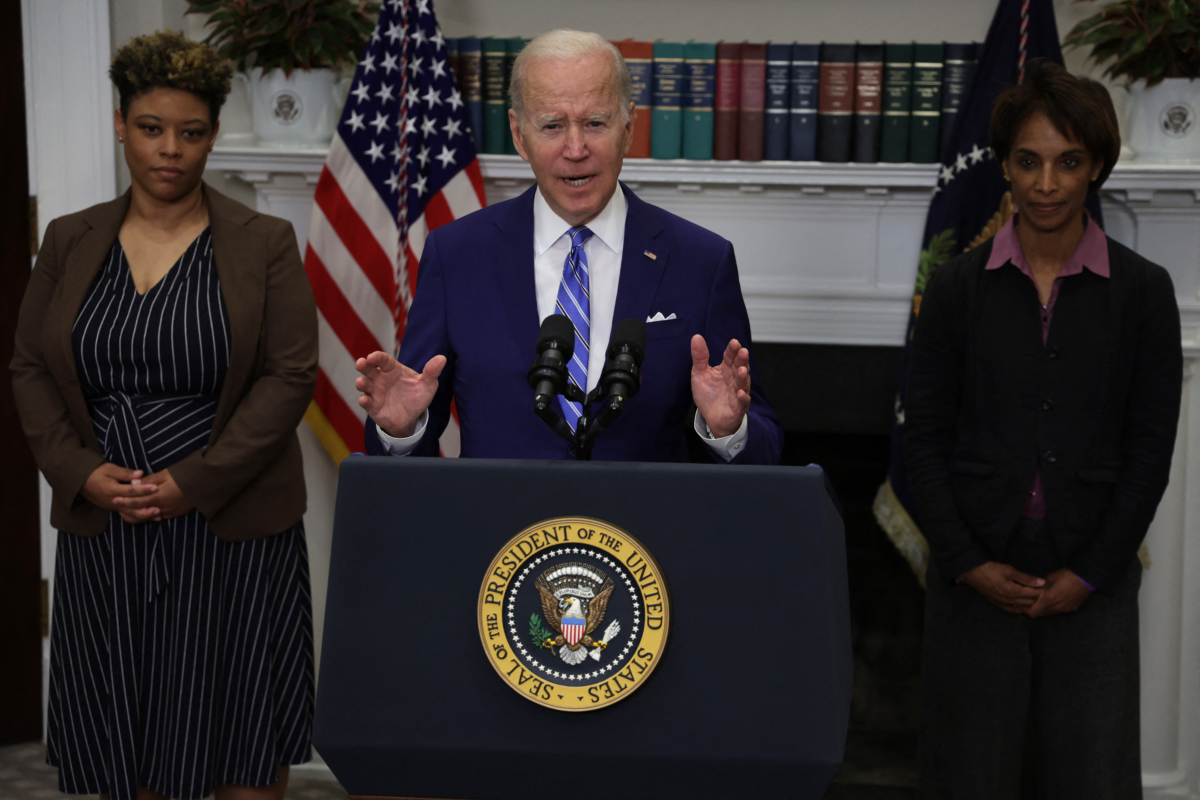 WASHINGTON, DC - MAY 04: U.S. President Joe Biden speaks as Director of the Office of Management and Budget Shalanda Young (L) and Assistant to the President & Chair of the Council of Economic Advisers Cecilia Rouse (R) listen during an event at the Roosevelt Room of the White House May 4, 2022 in Washington, DC. President Biden delivered remarks on economic growth, jobs, and deficit reduction. Alex Wong/Getty Images/AFP (Photo by ALEX WONG / GETTY IMAGES NORTH AMERICA / Getty Images via AFP)