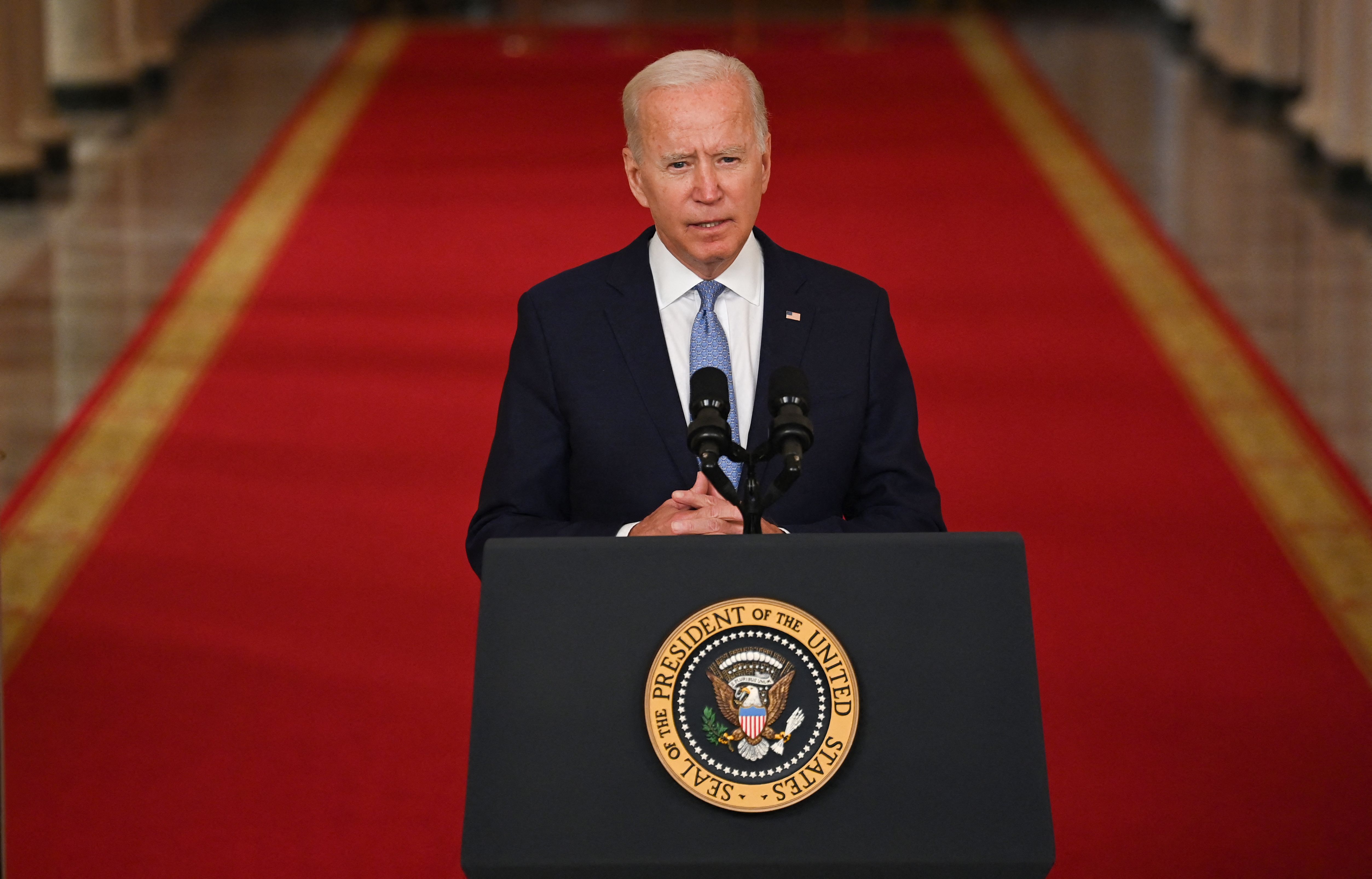 US President Joe Biden speaks on ending the war in Afghanistan in the State Dining Room at the White House in Washington, DC, on August 31, 2021. - US President Joe Biden is addressing the nation on the US exit from Afghanistan after a failed 20 year war that he'd vowed to end but whose chaotic last days are now overshadowing his presidency. (Photo by Brendan SMIALOWSKI / AFP)