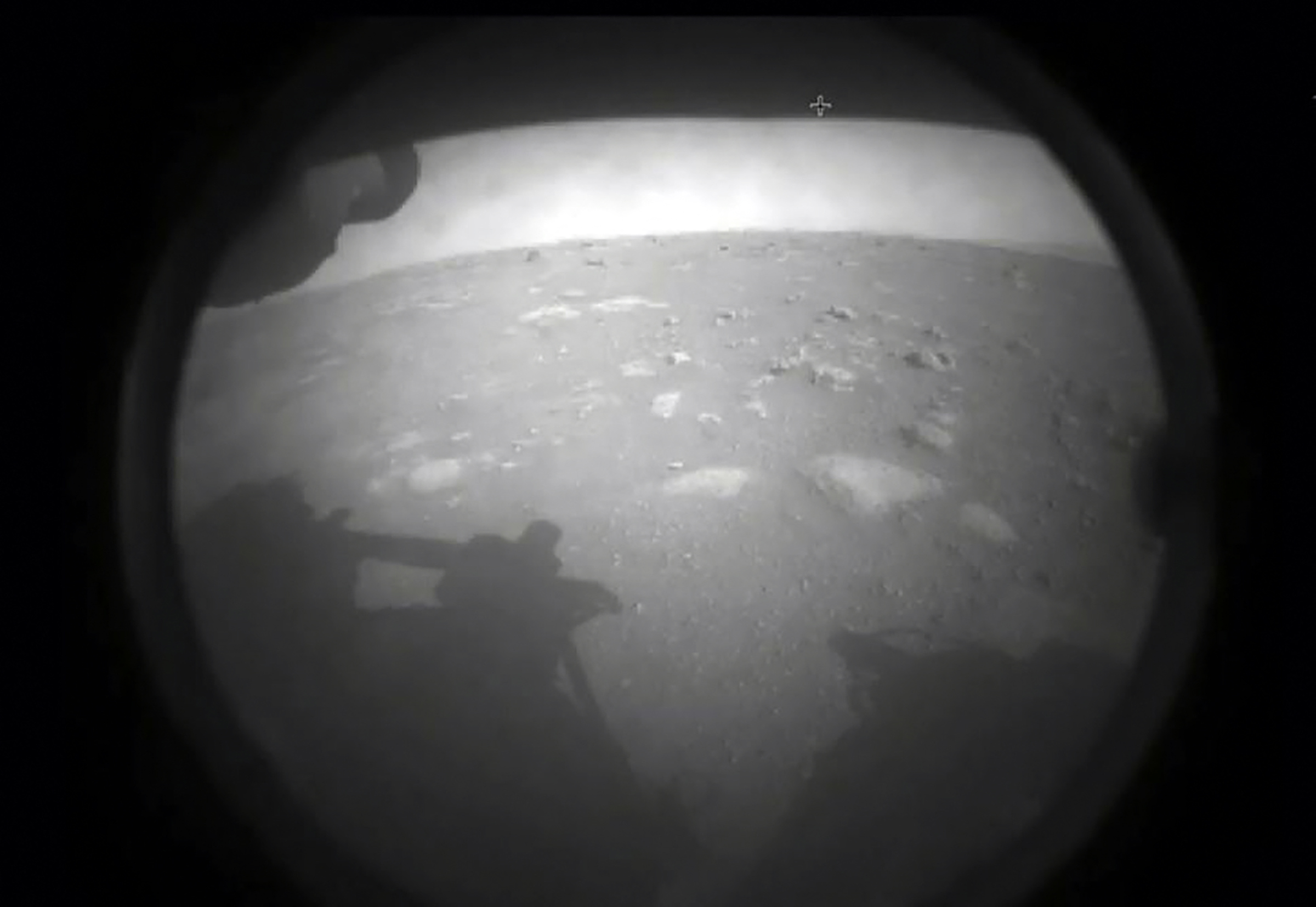 This NASA photo shows members of NASA�s Perseverance rover as it landed on the surface of Mars on February 18, 2021. - NASA said February 18, 2021 that the Perseverance rover has touched down on the surface of Mars after successfully overcoming a risky landing phase known as the "seven minutes of terror." "Touchdown confirmed," said operations lead Swati Mohan at around 3:55 pm Eastern Time (2055 GMT) as mission control at NASA's Jet Propulsion Laboratory headquarters erupted in cheers. The autonomously-guided procedure was completed more than 11 minutes earlier, which is how long it takes for radio signals to return to Earth. (Photo by Handout / NASA / AFP) / RESTRICTED TO EDITORIAL USE - MANDATORY CREDIT "AFP PHOTO / NASA/HANDOUT" - NO MARKETING - NO ADVERTISING CAMPAIGNS - DISTRIBUTED AS A SERVICE TO CLIENTS