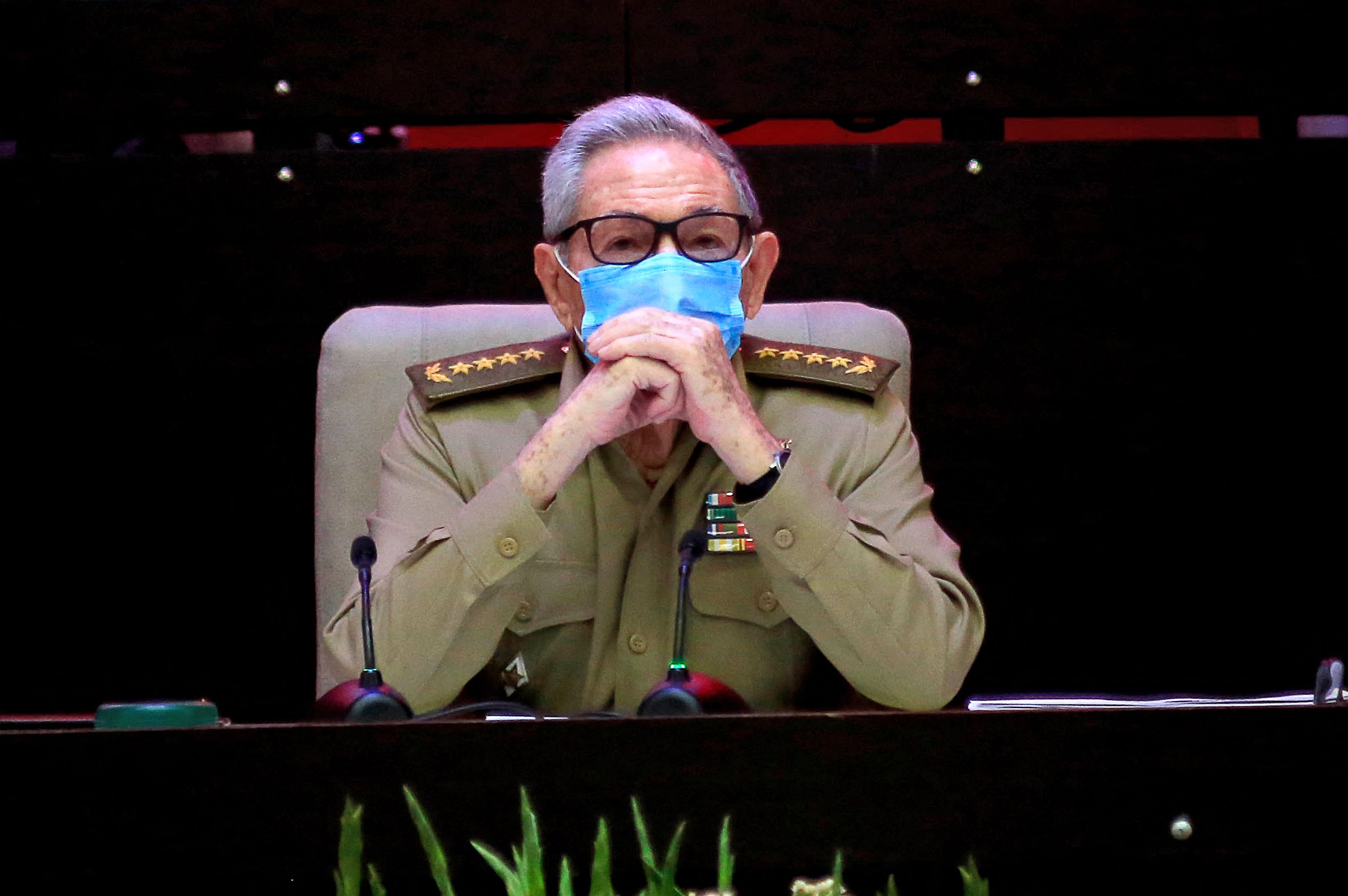 Picture released by Cuban News Agency (ACN) of Cuban First Secretary of the Communist Party Raul Castro attending the opening session of the 8th Congress of the Cuban Communist Party at the Convention Palace in Havana, on April 16, 2021. - The 8th Congress of the Cuban Communist Party (PCC) starting Friday will end over six decades of the government of Fidel and Raul Castro, giving way to a new generation. (Photo by Ariel LEY ROYERO / ACN / AFP) / RESTRICTED TO EDITORIAL USE - MANDATORY CREDIT AFP PHOTO / ACN / ARIEL LEY ROYERO - NO MARKETING NO ADVERTISING CAMPAIGNS -DISTRIBUTED AS A SERVICE TO CLIENTS
